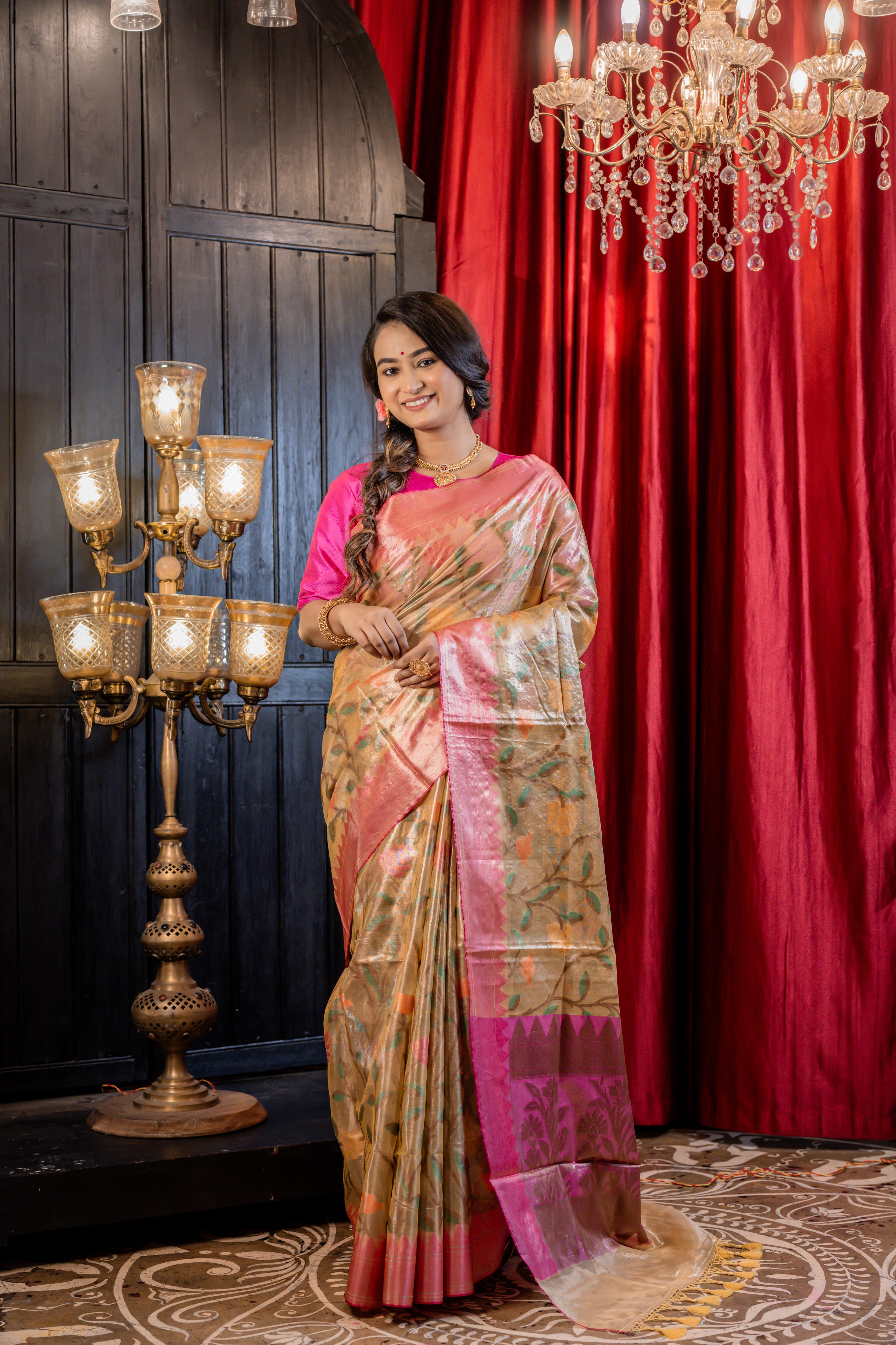 Ishya || Light Gold Pure Tissue Banarasi Handloom Saree with all over Multi-colour Floral Jaal, Magenta Pink border & Antique Gold Pallu
