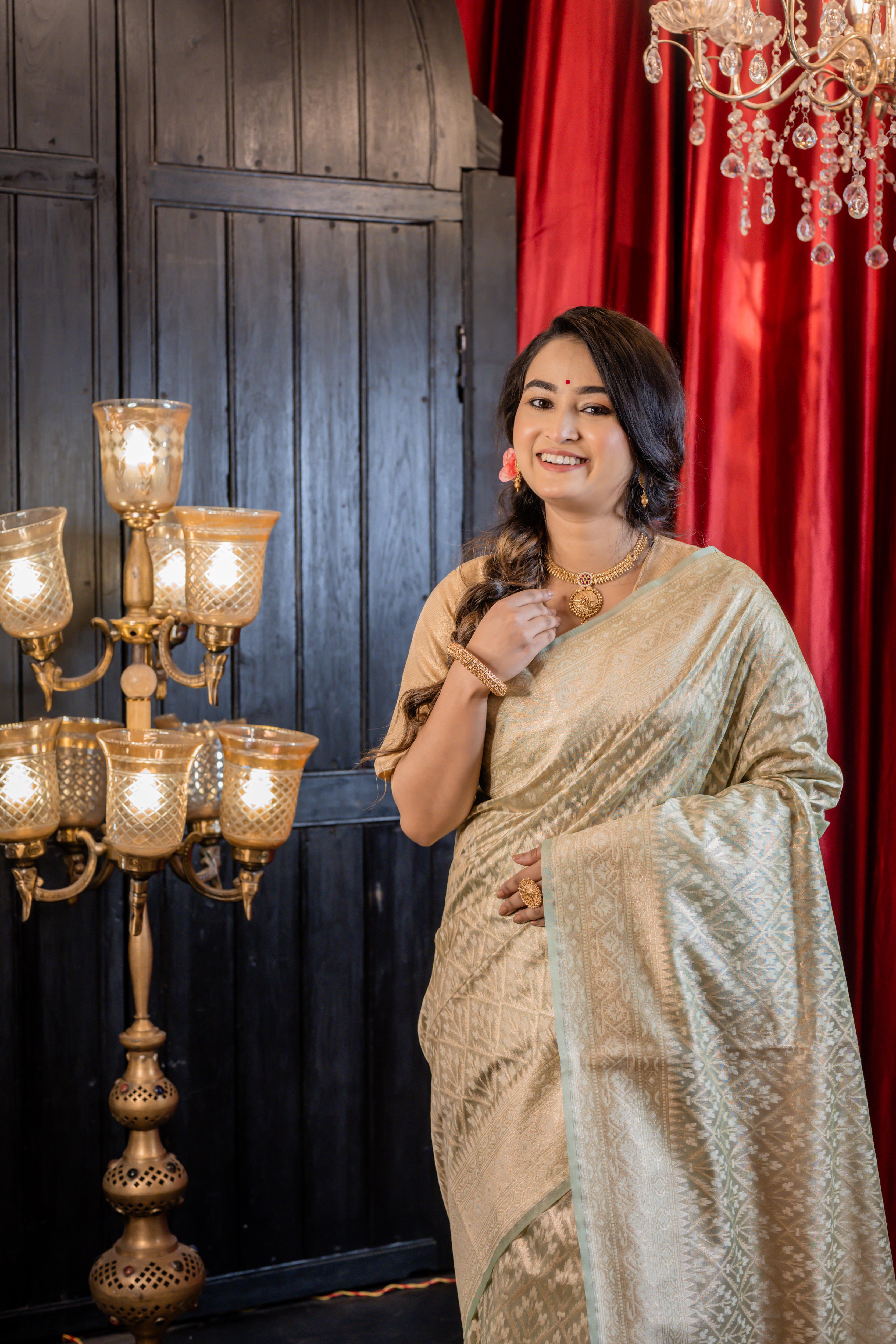 Snigdha || Mint Green Chanderi Katan Tissue Banarasi Saree with all over Leaf motif Buta & Jaal woven in Matte Gold Zari