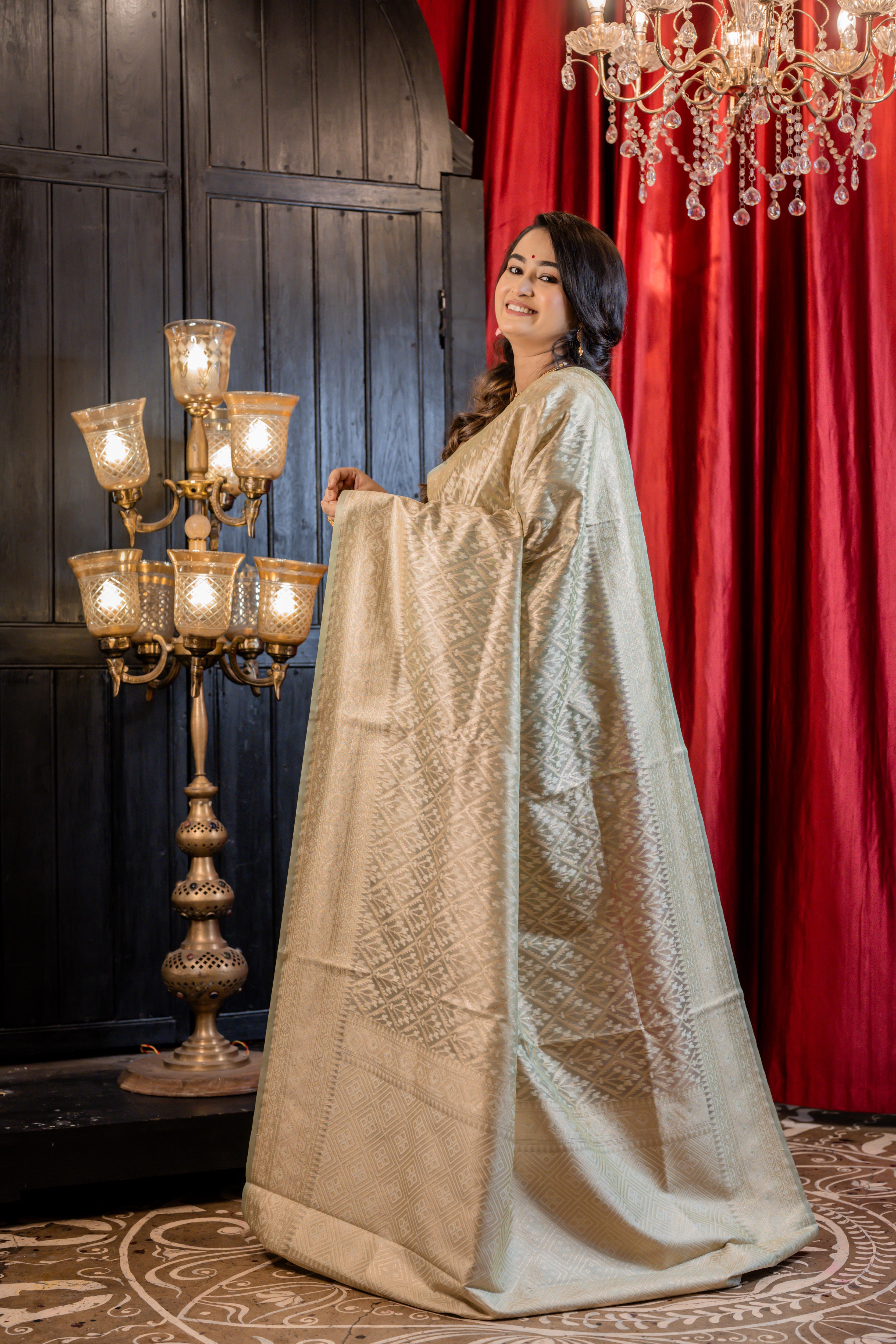 Snigdha || Mint Green Chanderi Katan Tissue Banarasi Saree with all over Leaf motif Buta & Jaal woven in Matte Gold Zari