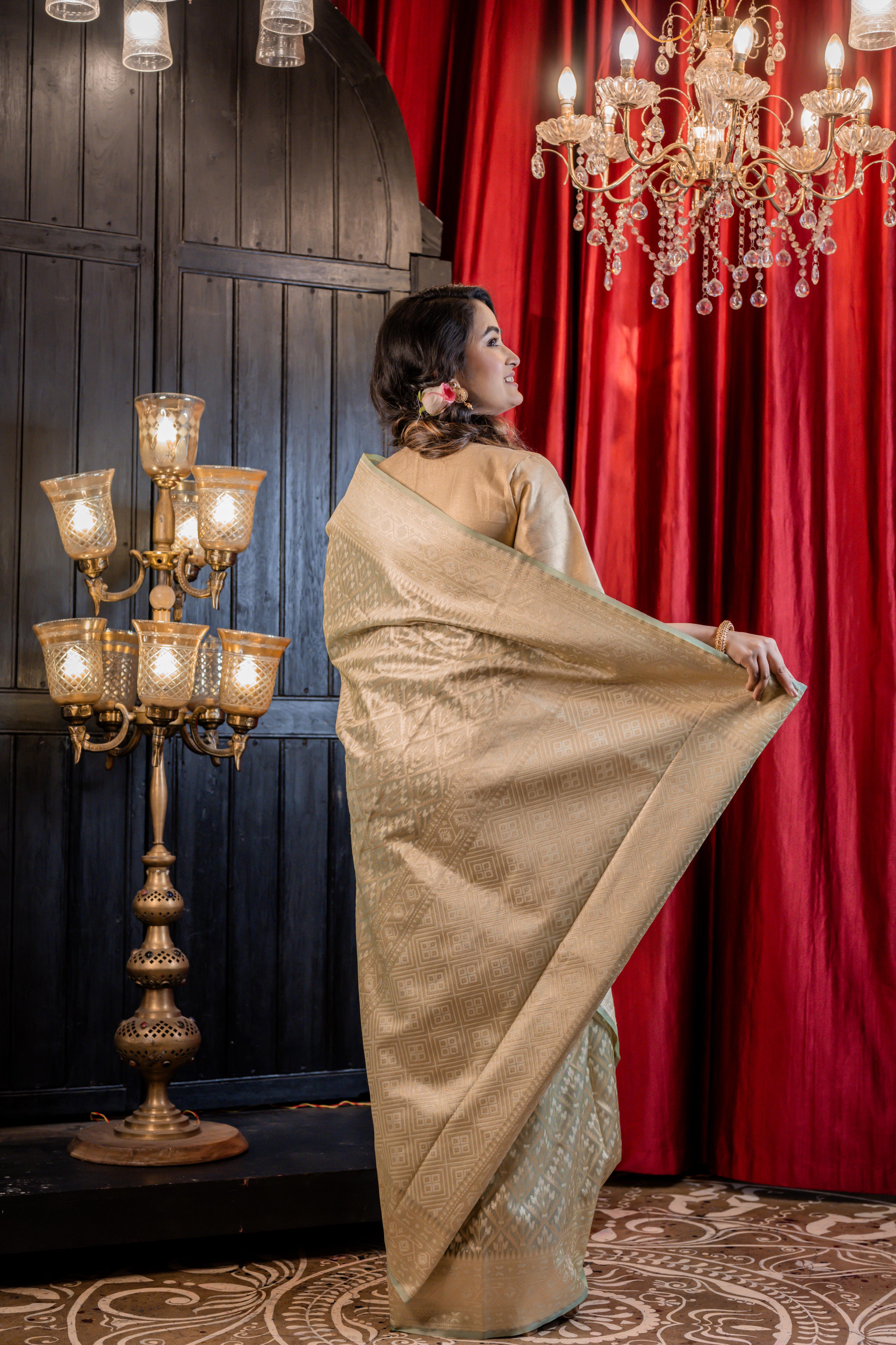 Snigdha || Mint Green Chanderi Katan Tissue Banarasi Saree with all over Leaf motif Buta & Jaal woven in Matte Gold Zari