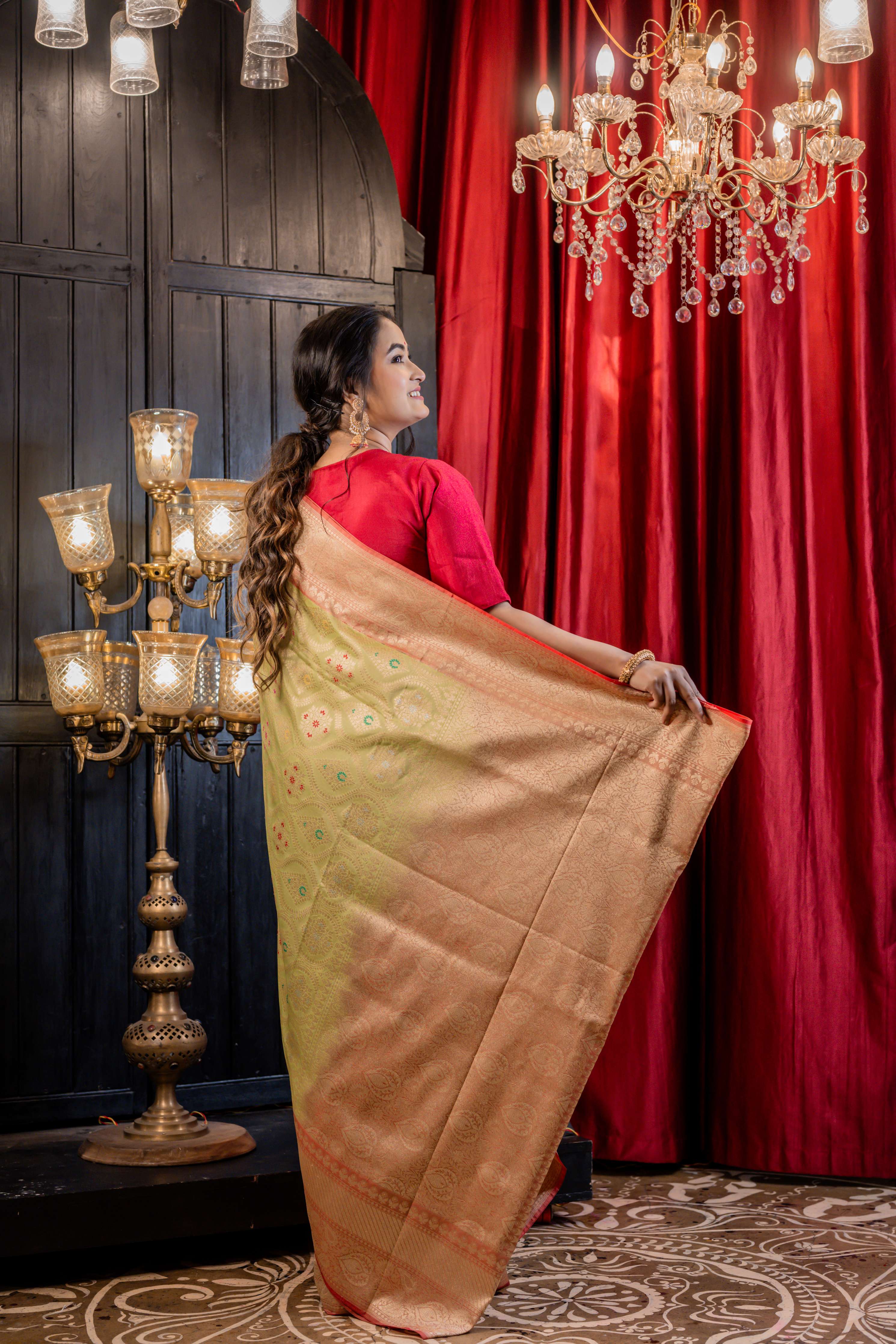 Palashini || Pista Green Matka Silk Banarasi Saree with Multi-colour Meenakari highlights, all over Jaal woven in Matte Gold Zari and Pale Orange border