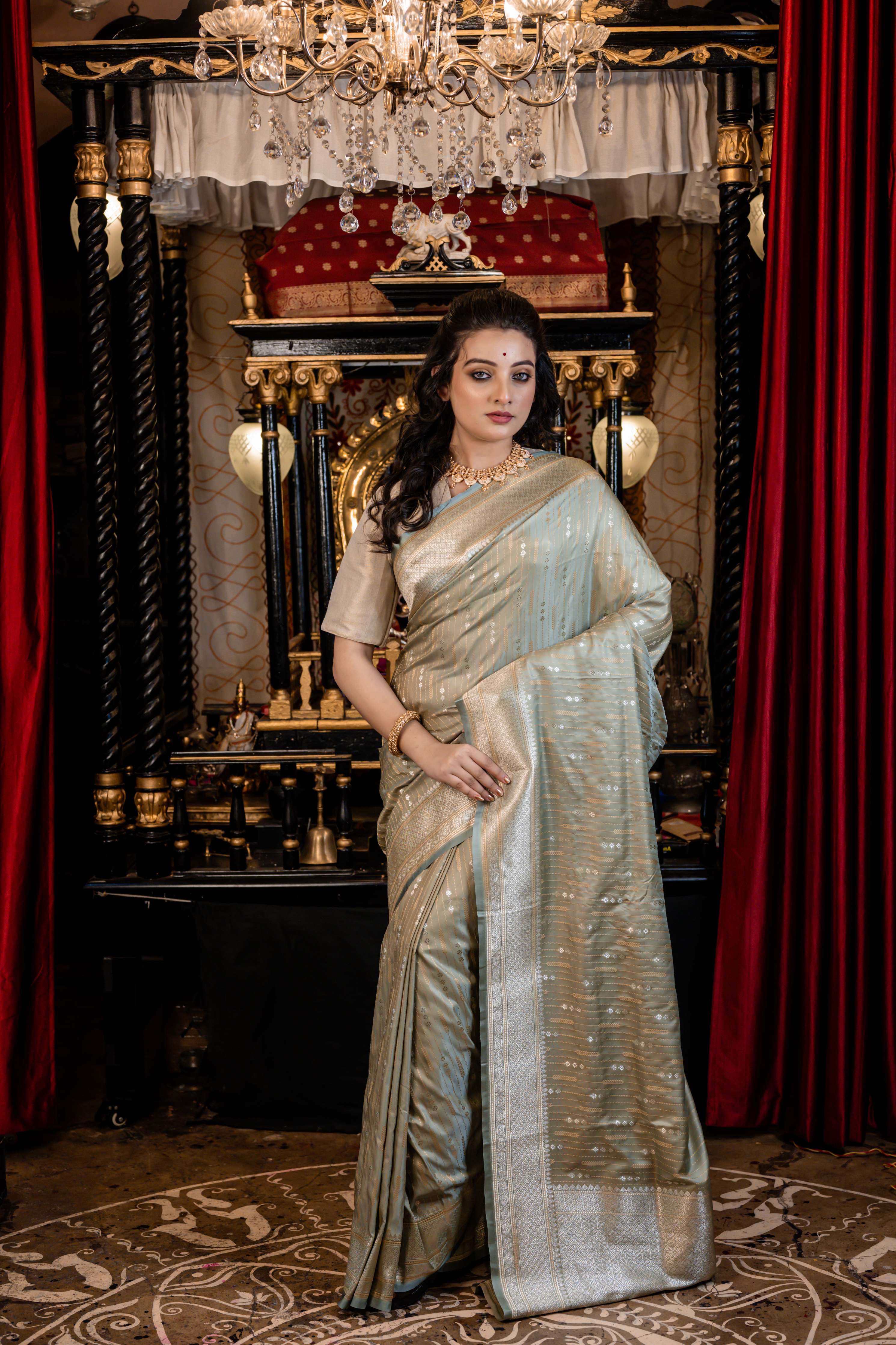 Lavina || Light Sage Green Mashru Silk Banarasi Saree with all over Buta and Stripes in Silver Zari