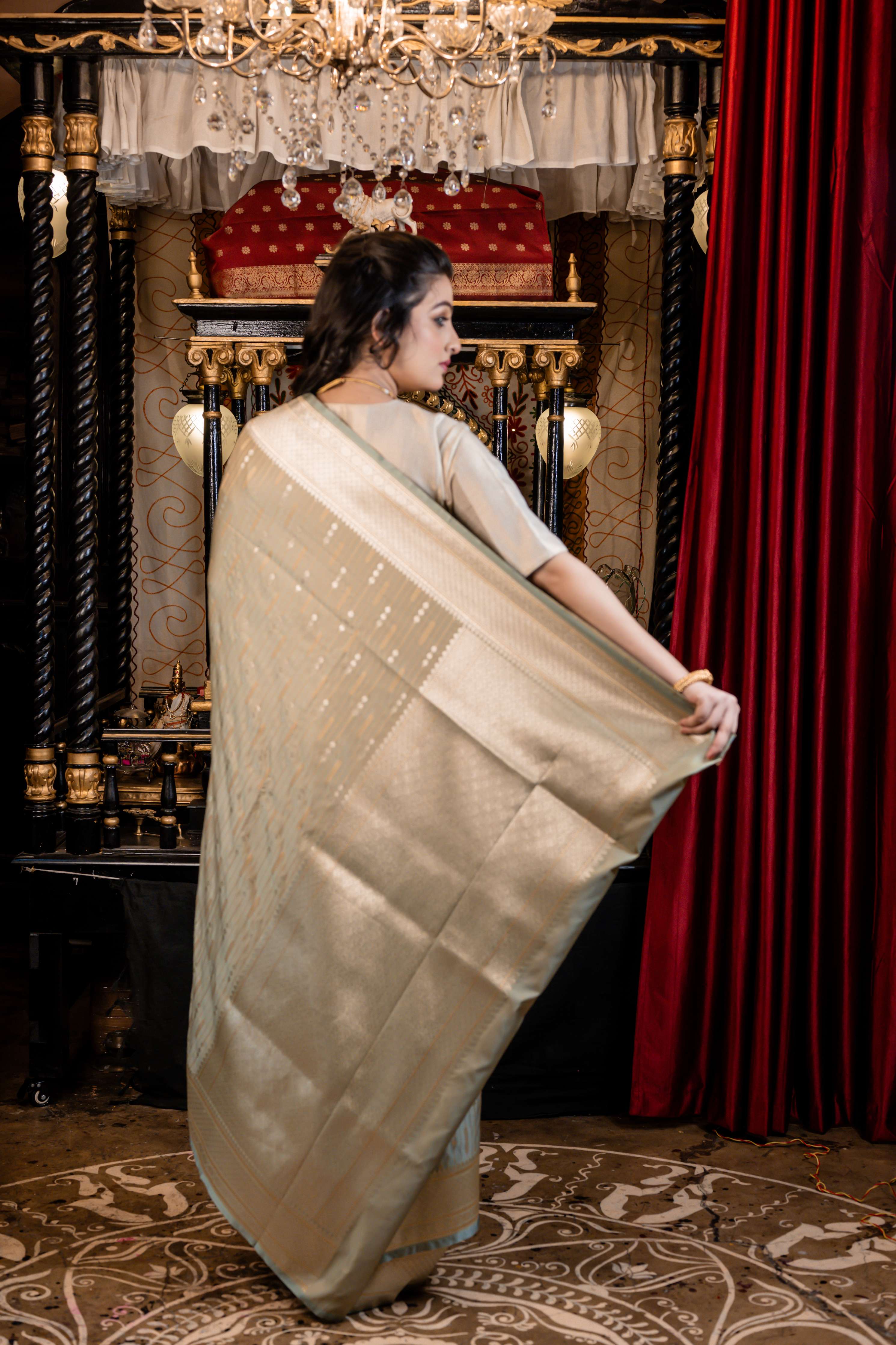 Lavina || Light Sage Green Mashru Silk Banarasi Saree with all over Buta and Stripes in Silver Zari