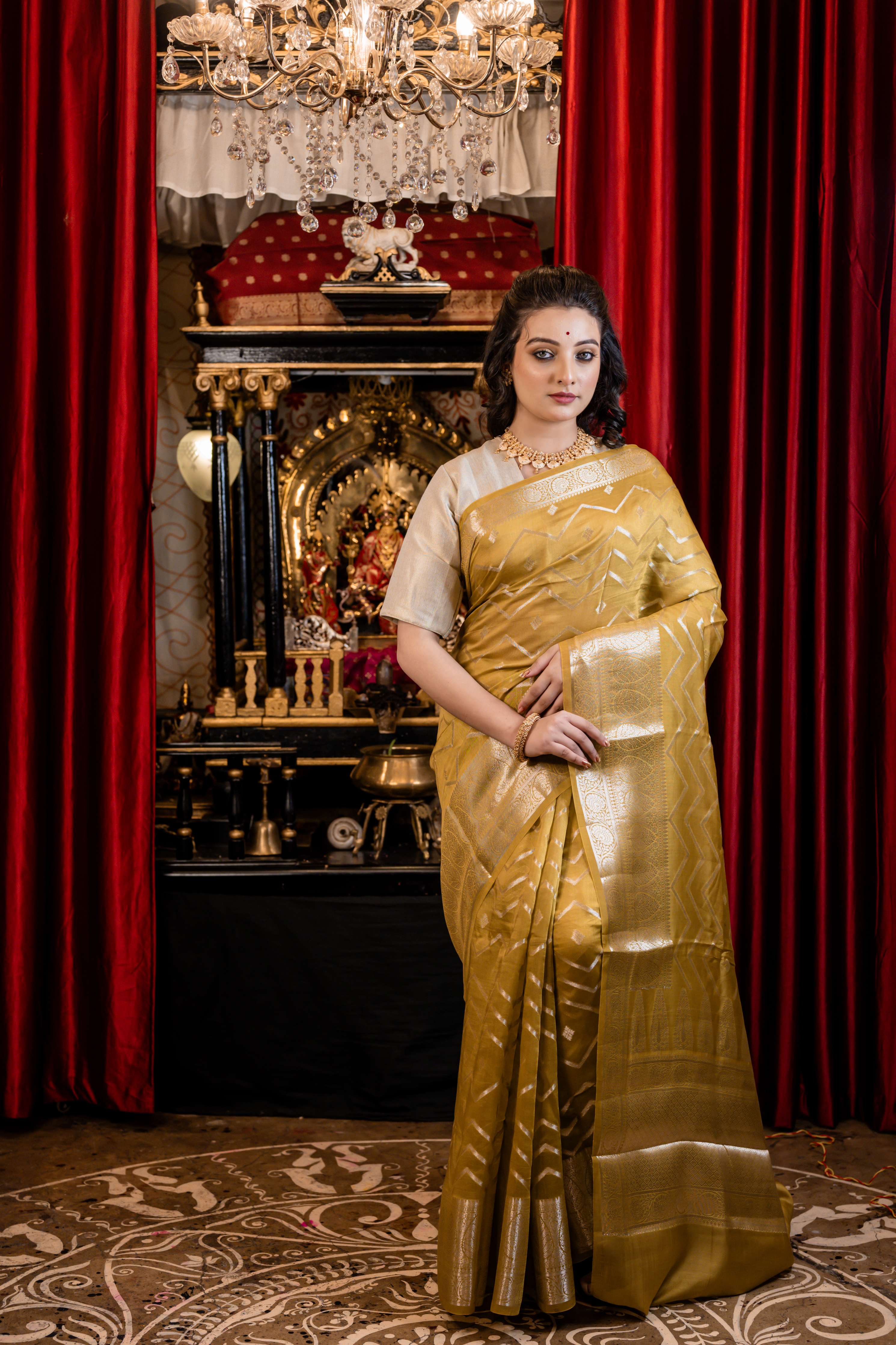 Laya || Olive Green Chinia Silk Banarasi Saree with all over Buta & Zigzag Stripe woven in Silver Zari