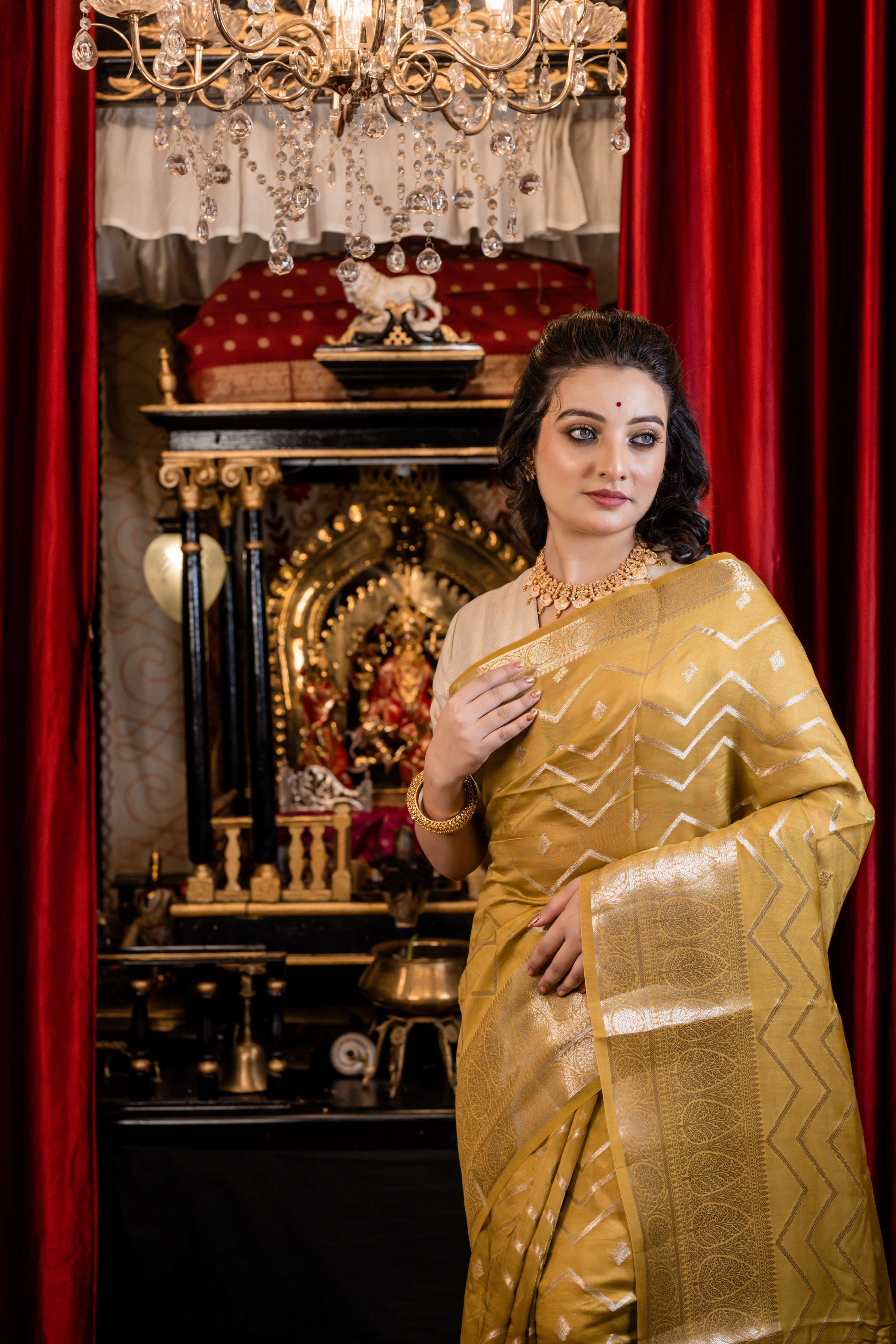 Laya || Olive Green Chinia Silk Banarasi Saree with all over Buta & Zigzag Stripe woven in Silver Zari