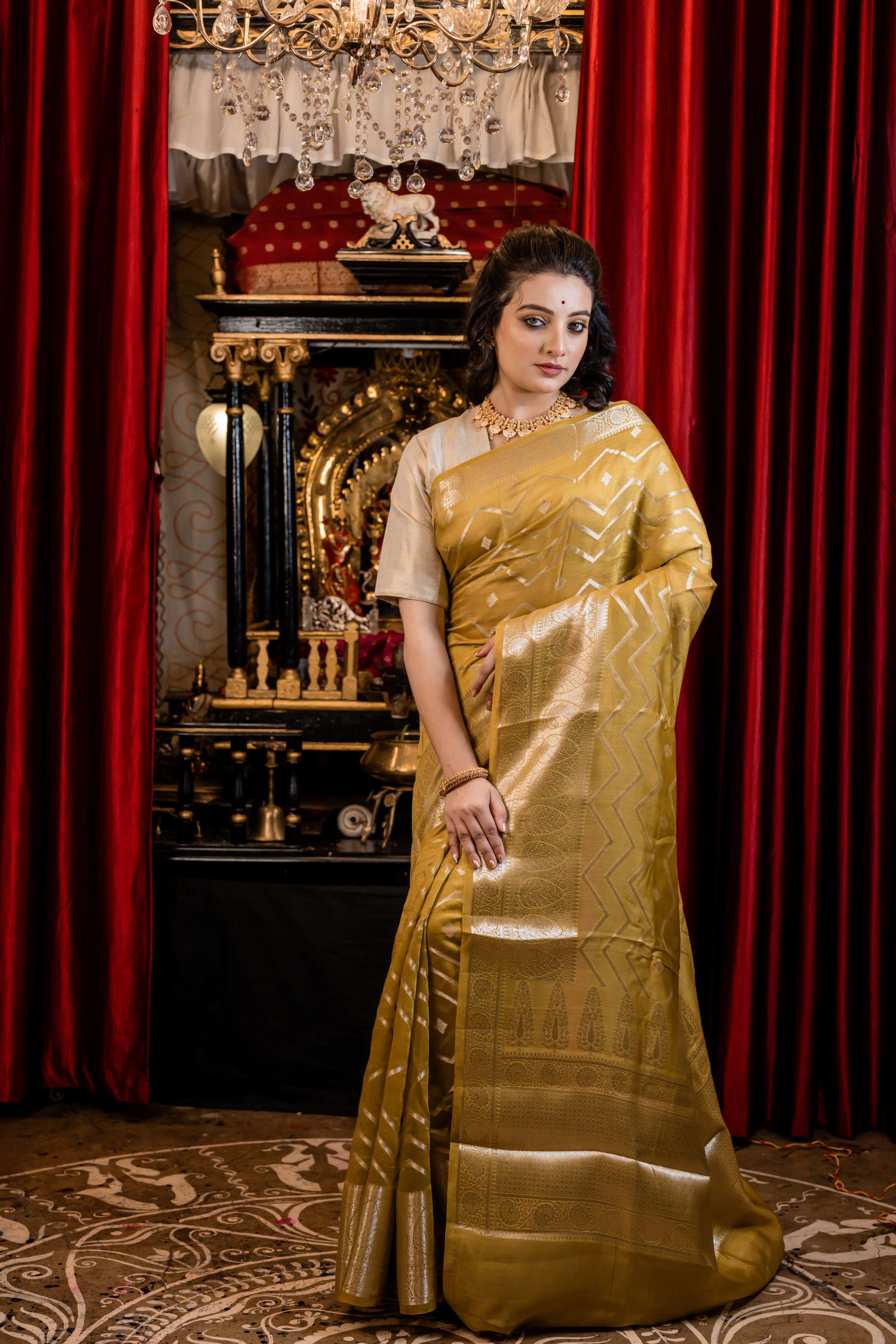 Laya || Olive Green Chinia Silk Banarasi Saree with all over Buta & Zigzag Stripe woven in Silver Zari
