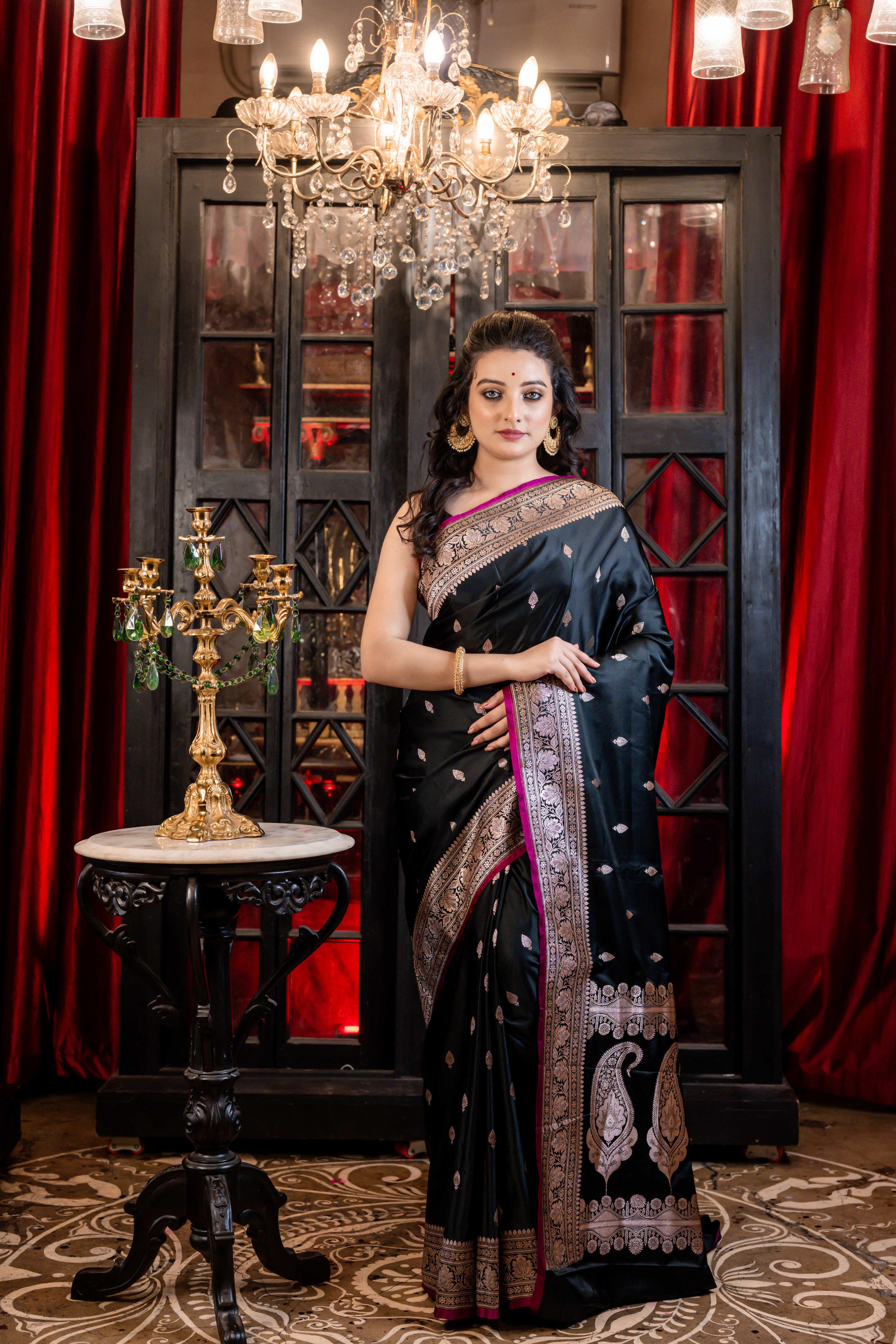 Yamini || Black Banarasi Mashru Silk Banarasi Saree with all over Copper Zari Buta and sleek Magenta border