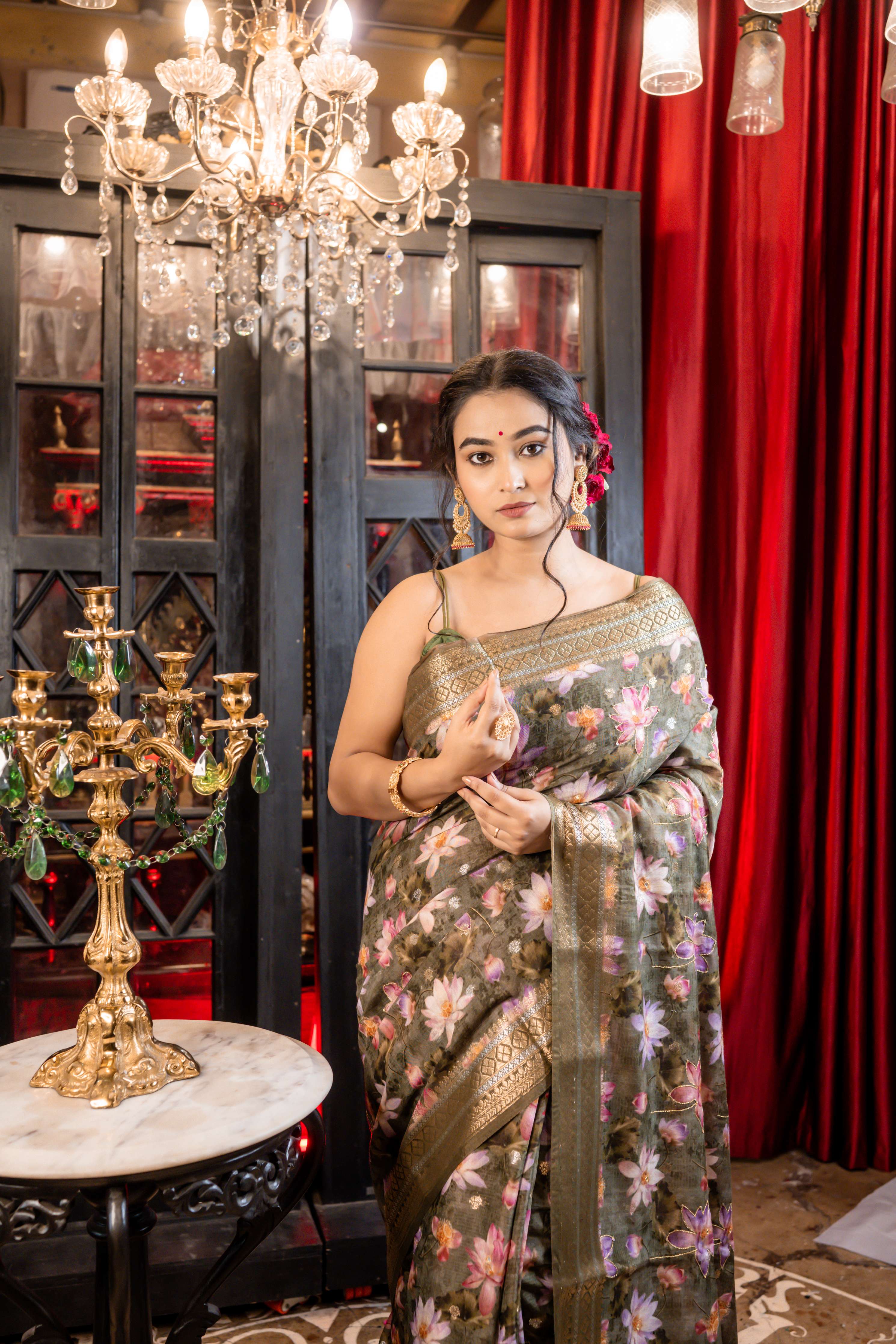 Kumud || Moss Green Chanderi blend Banarasi Saree with all over Floral Digital Print and Sona Rupa Buta with Mirror & Gold Zari highlights