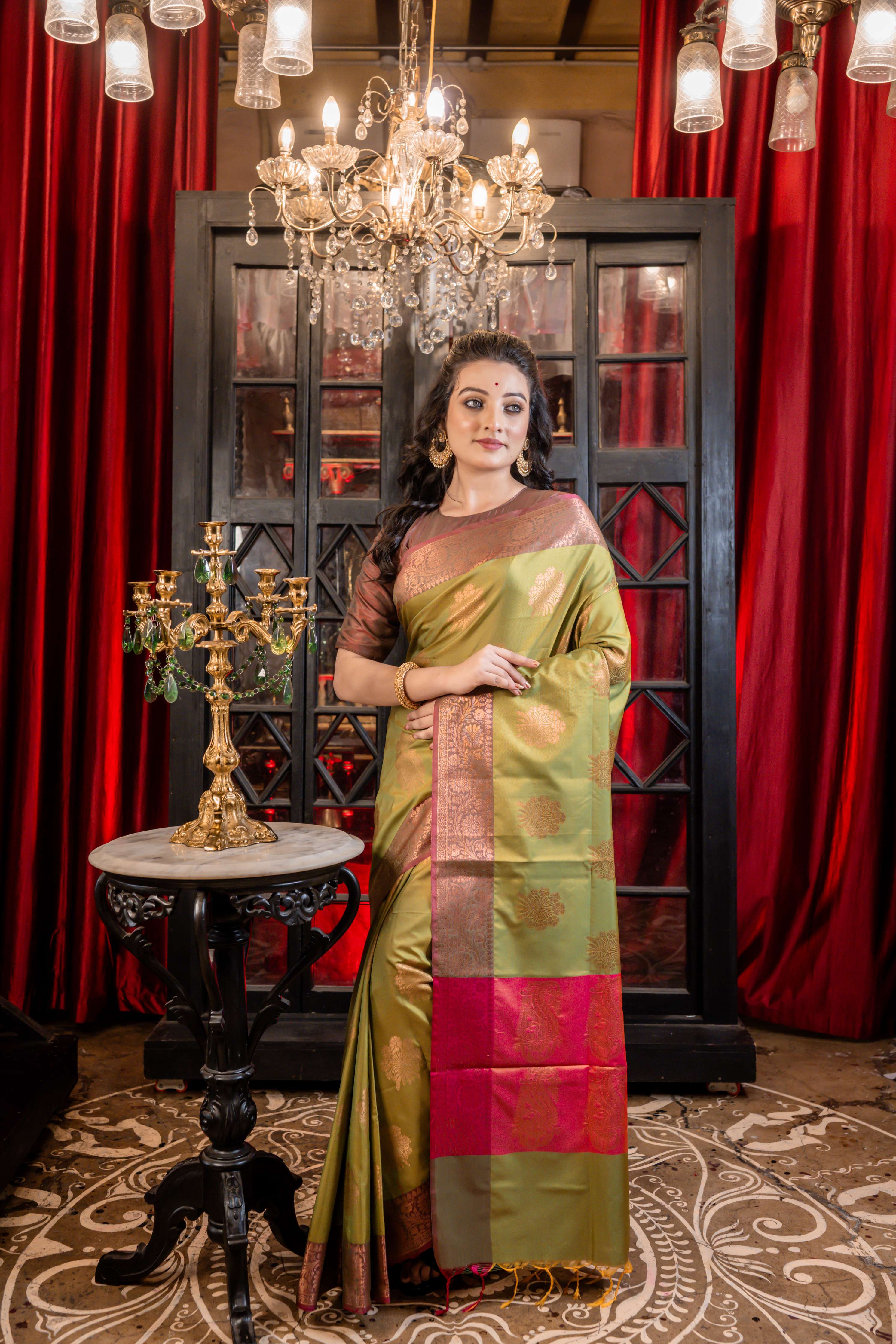 Shevanti || Sap Green & Mustard Yellow dual tone Soft Katan Banarasi Saree with all over Copper Zari Floral buta and border