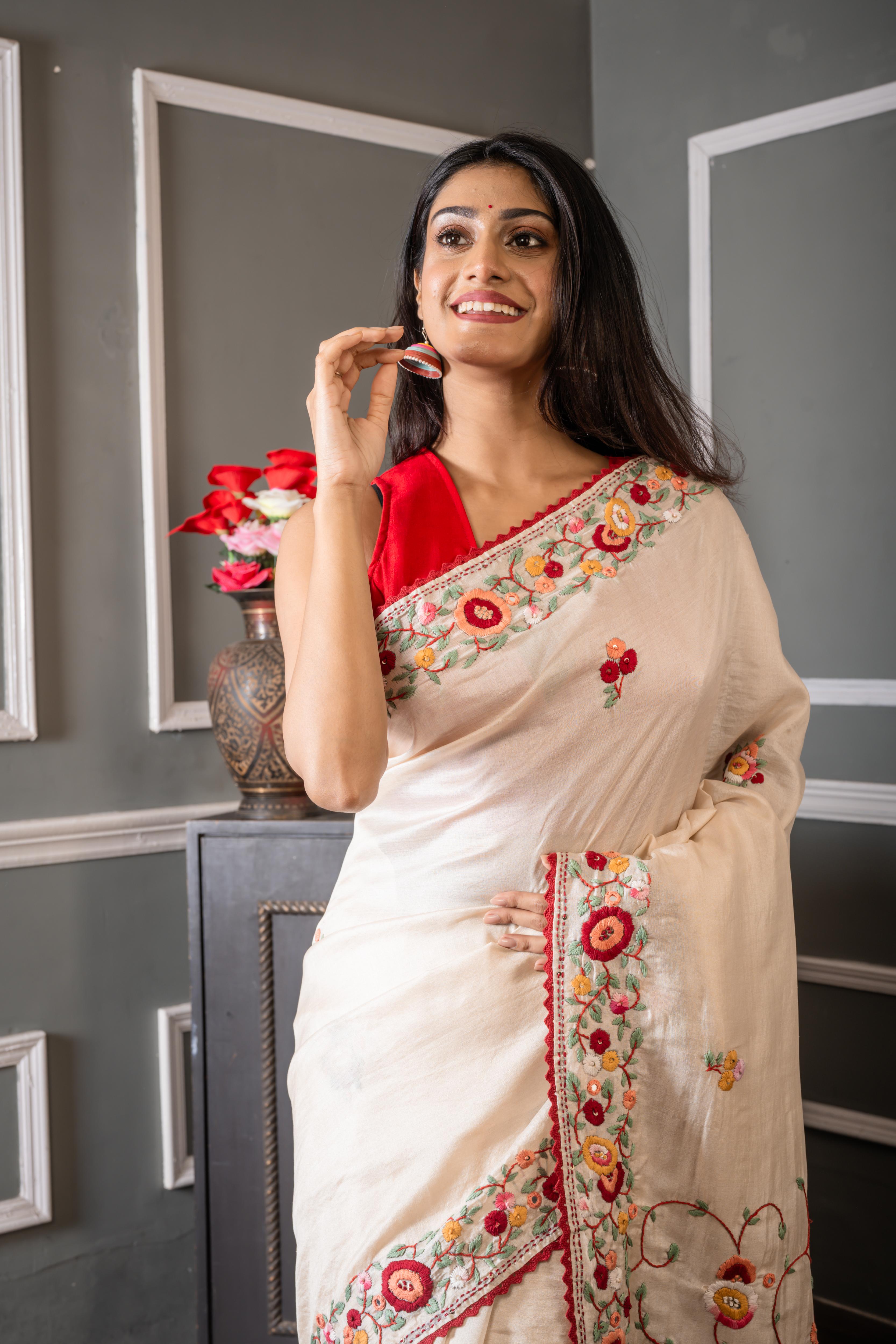 Madhushree || Off-White Pure Tussar Silk Hand Embroidery Saree with all over Multi-colour Resham Parsi Gara Floral motif and Sequins Highlights