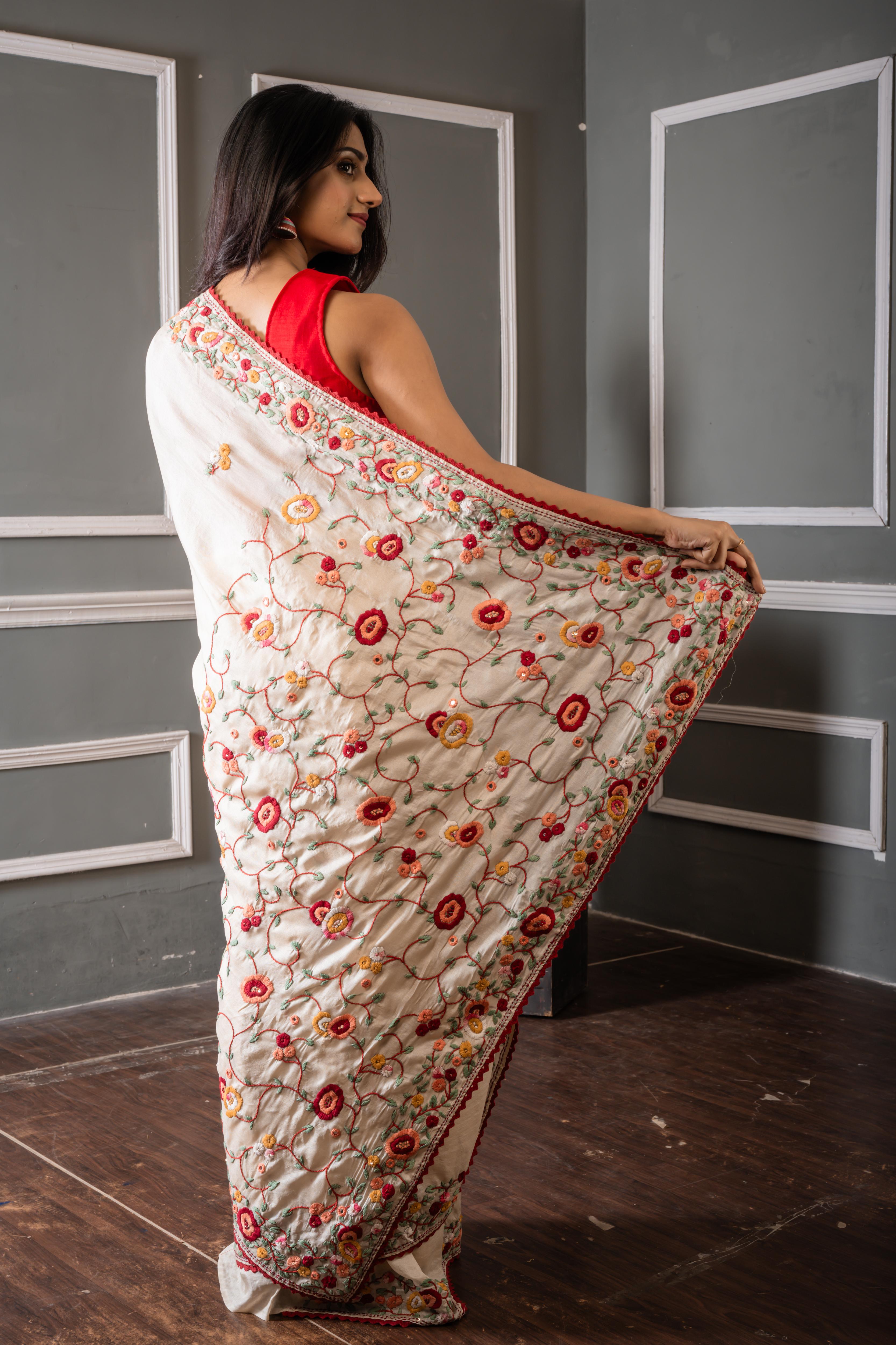 Madhushree || Off-White Pure Tussar Silk Hand Embroidery Saree with all over Multi-colour Resham Parsi Gara Floral motif and Sequins Highlights