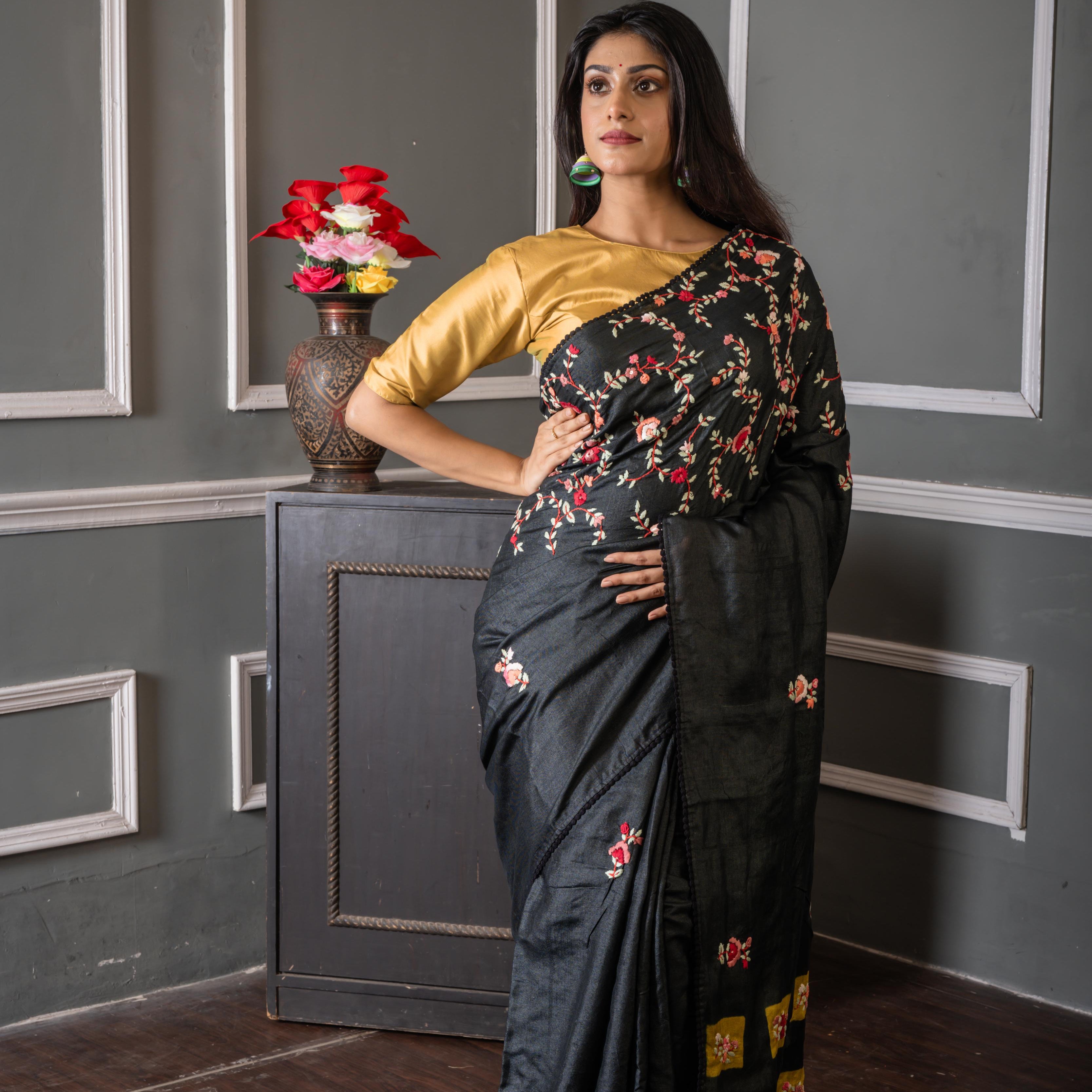 Nayanika || Carbon Black Pure Tussar Silk Hand Embroidery Saree with all over Multi-colour Resham Boolean Floral motif, Sequins Highlights and Olive Green Shibori Print Pallu