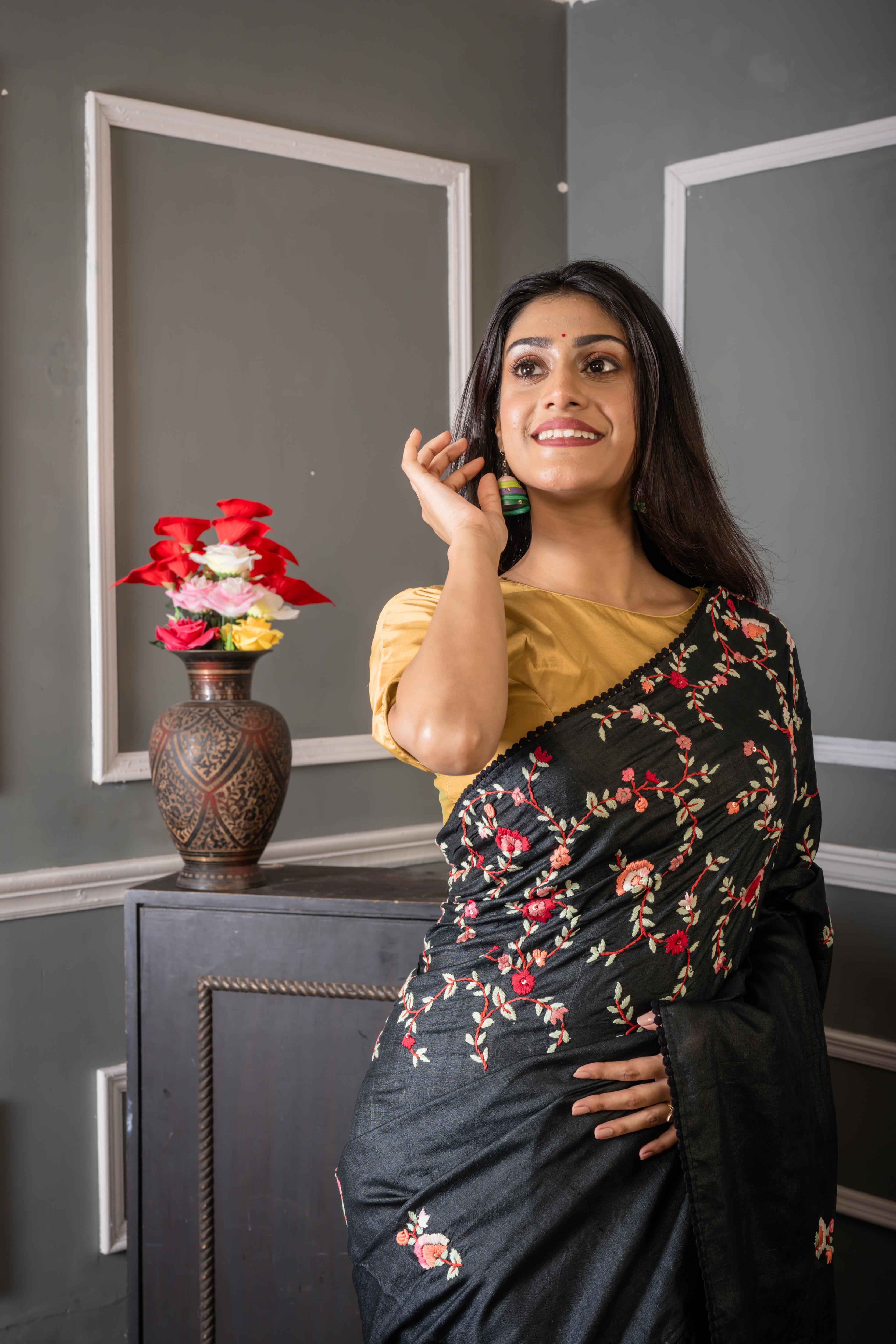 Nayanika || Carbon Black Pure Tussar Silk Hand Embroidery Saree with all over Multi-colour Resham Boolean Floral motif, Sequins Highlights and Olive Green Shibori Print Pallu