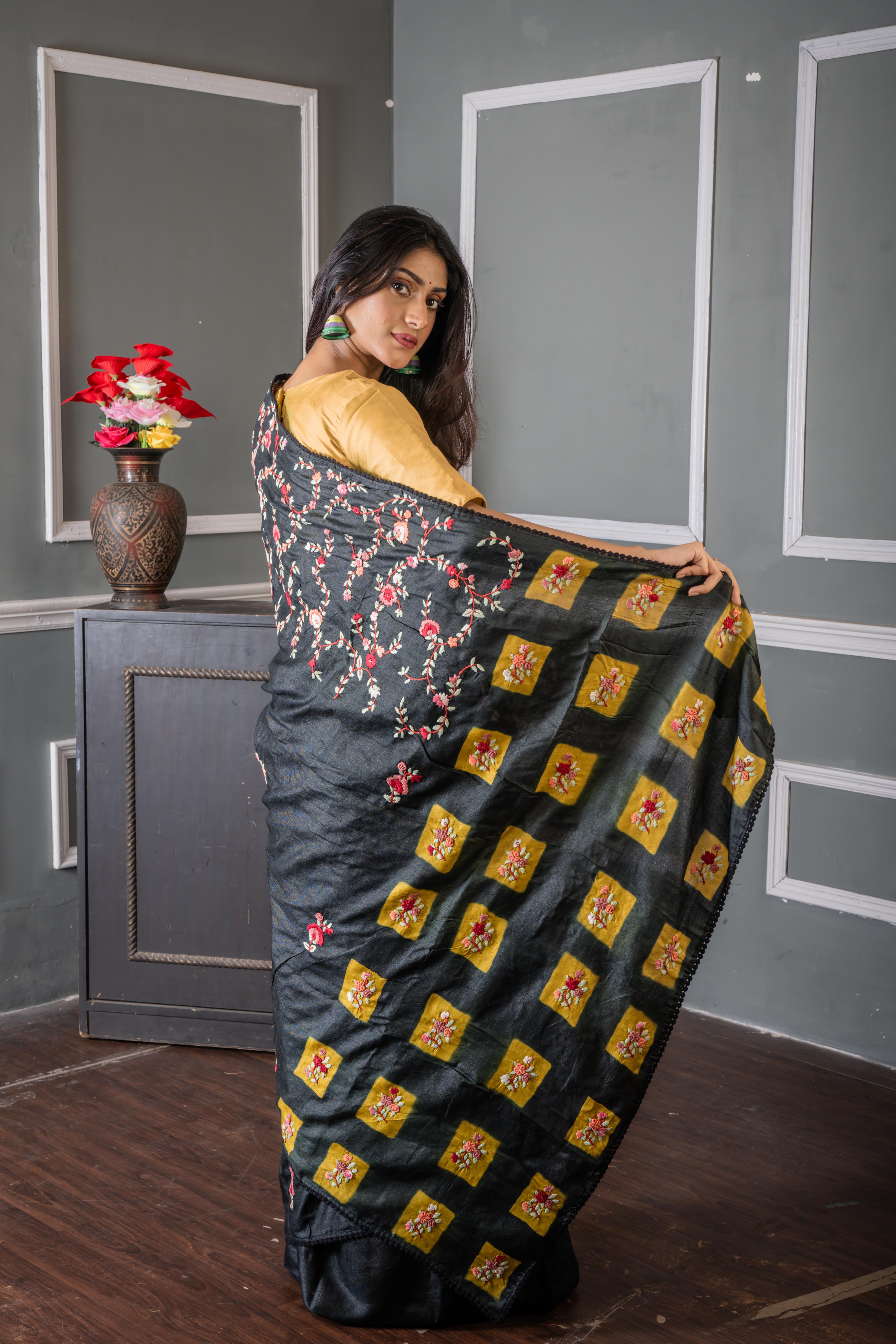 Nayanika || Carbon Black Pure Tussar Silk Hand Embroidery Saree with all over Multi-colour Resham Boolean Floral motif, Sequins Highlights and Olive Green Shibori Print Pallu