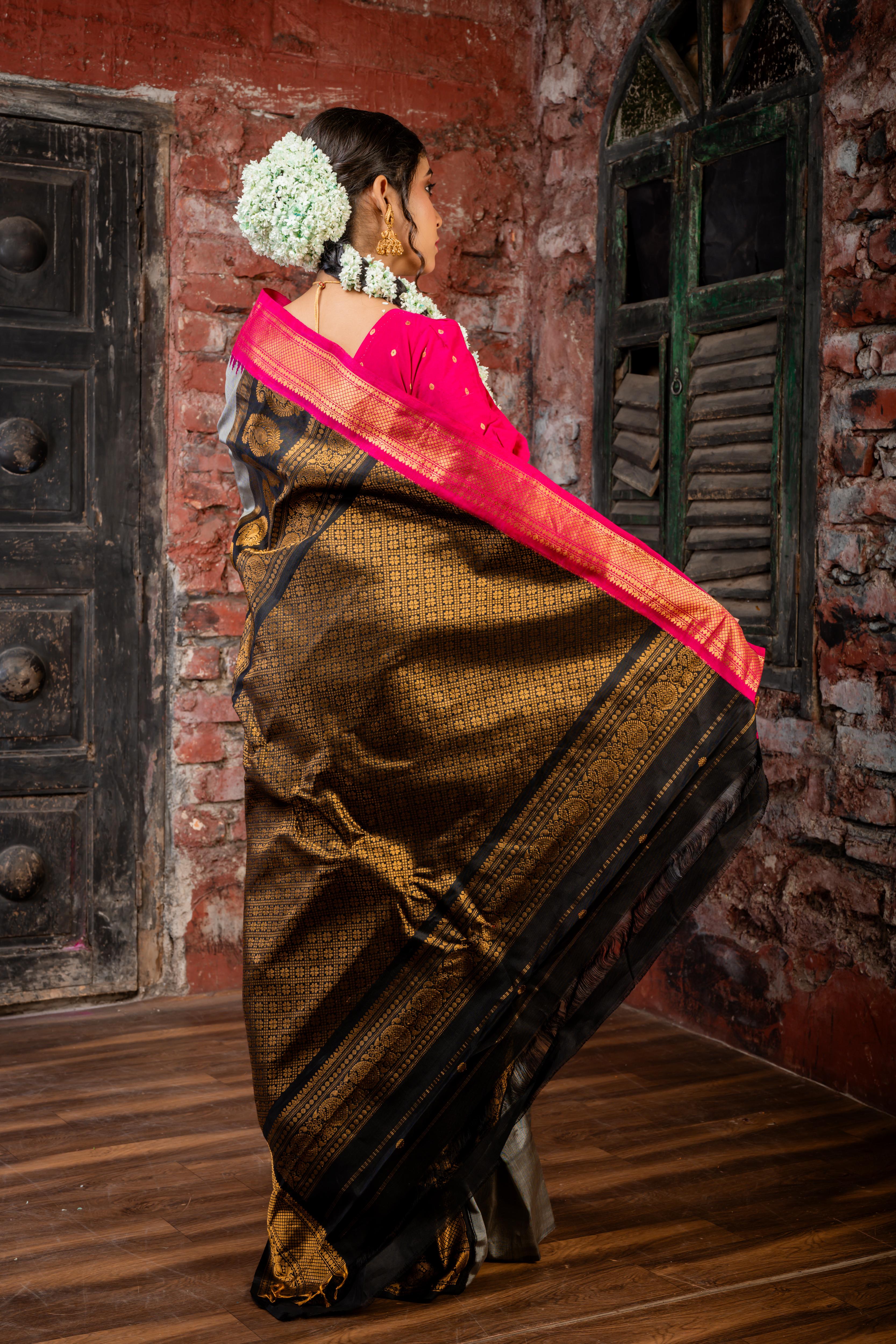 Rajeshwari || Smokey Grey Pure Gadwal Silk Handloom Saree with all over Antique Gold Buti, Magenta & Black 'Temple' & Antique Zari 'Ganga-Jamuna' Border and Black Pallu in Traditional Antique Gold Zari design