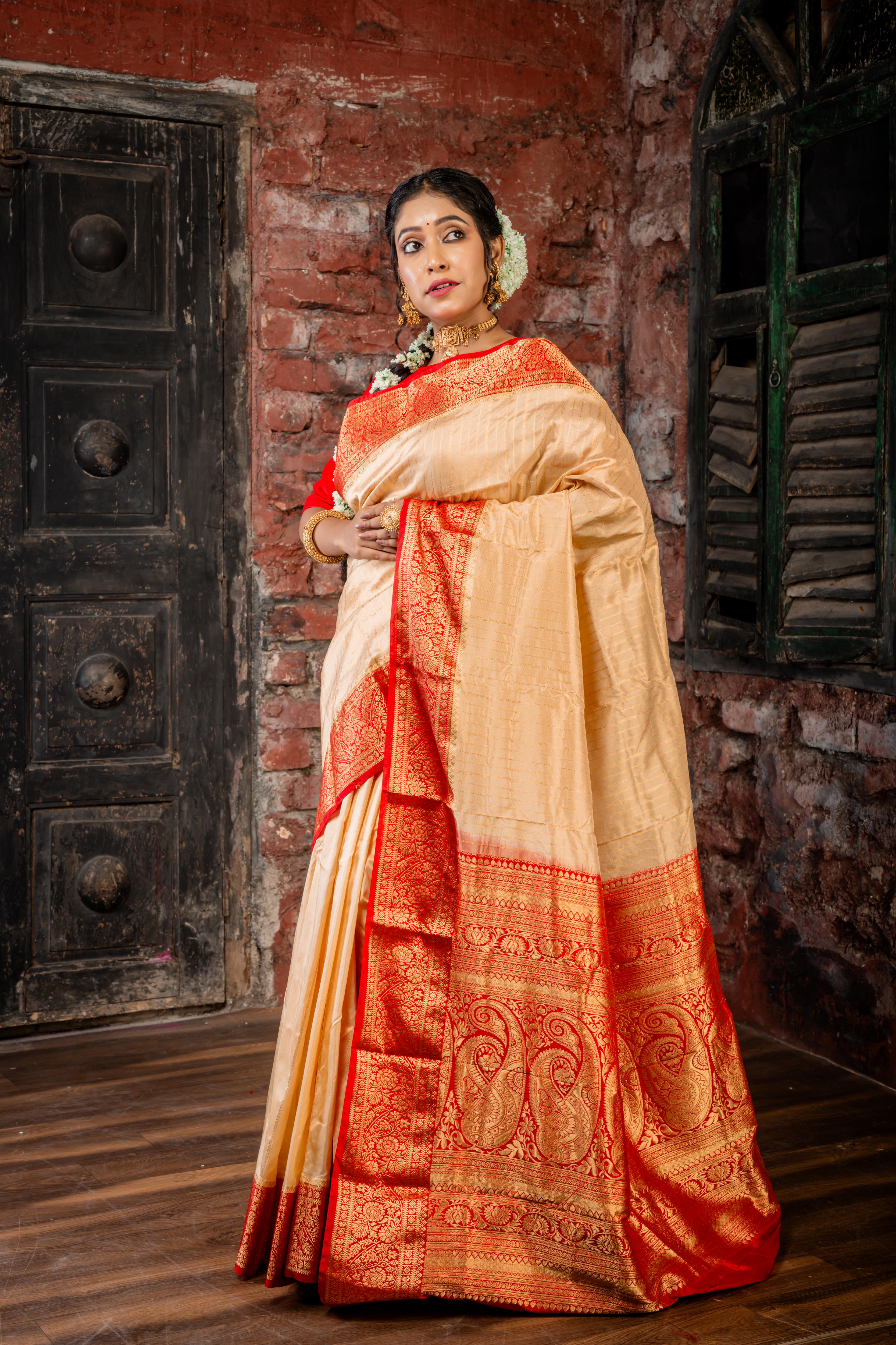 Aadhya || Golden Beige Pure Kanjivaram Silk Handloom Saree with all over Golden Zari traditional design Stripe, Red broad & Golden Zari Border and traditional design 'Kalka' motif Pallu