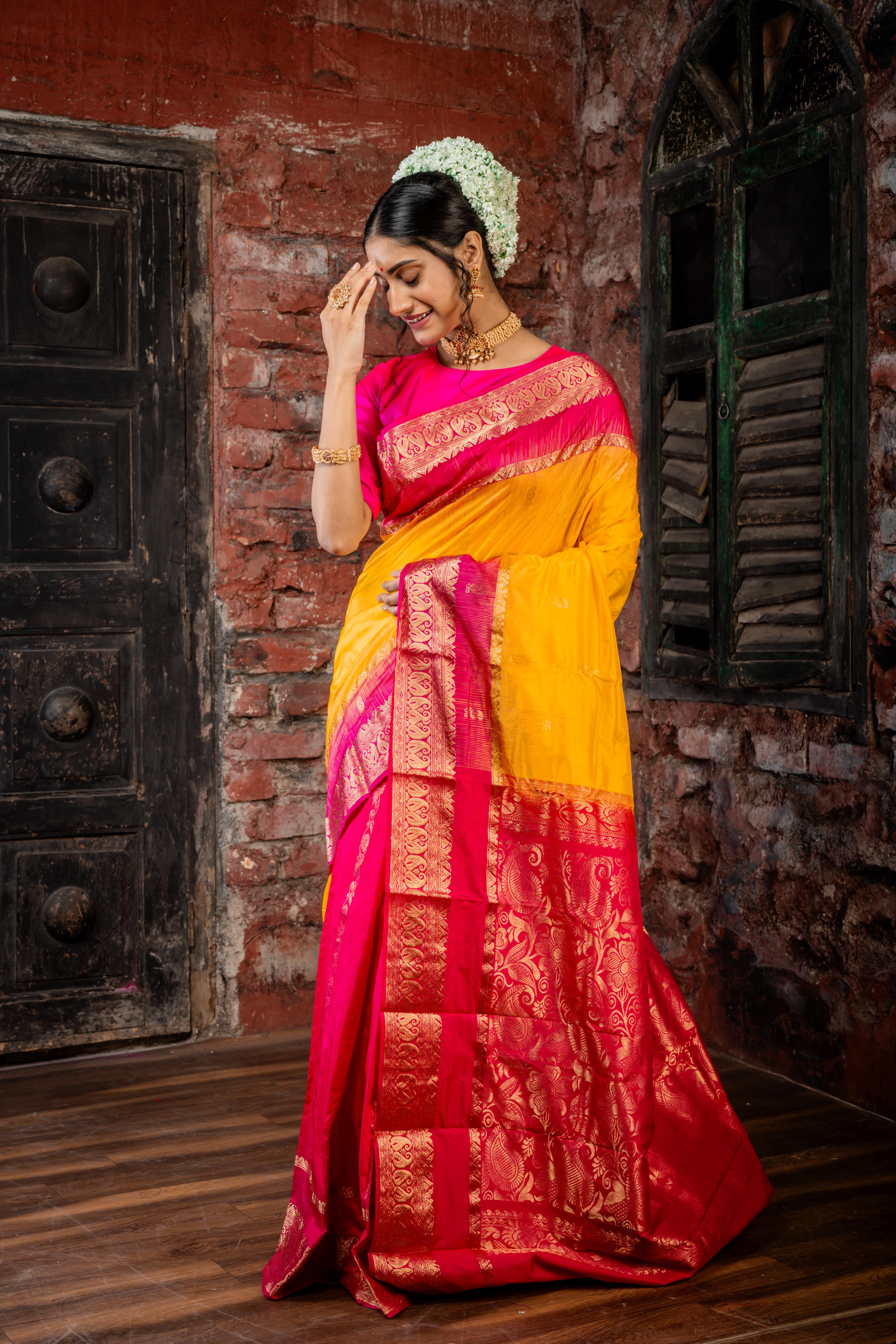 Pitambari || Half Body Turmeric Yellow & Matte Gold Zari Buta and Half Body Magenta Pink & Matte Gold Zari Stripe 'Patli Pallu' Kanjivaram Silk Saree with Magenta Pink & Antique Gold Zari Traditional design Border & Pallu