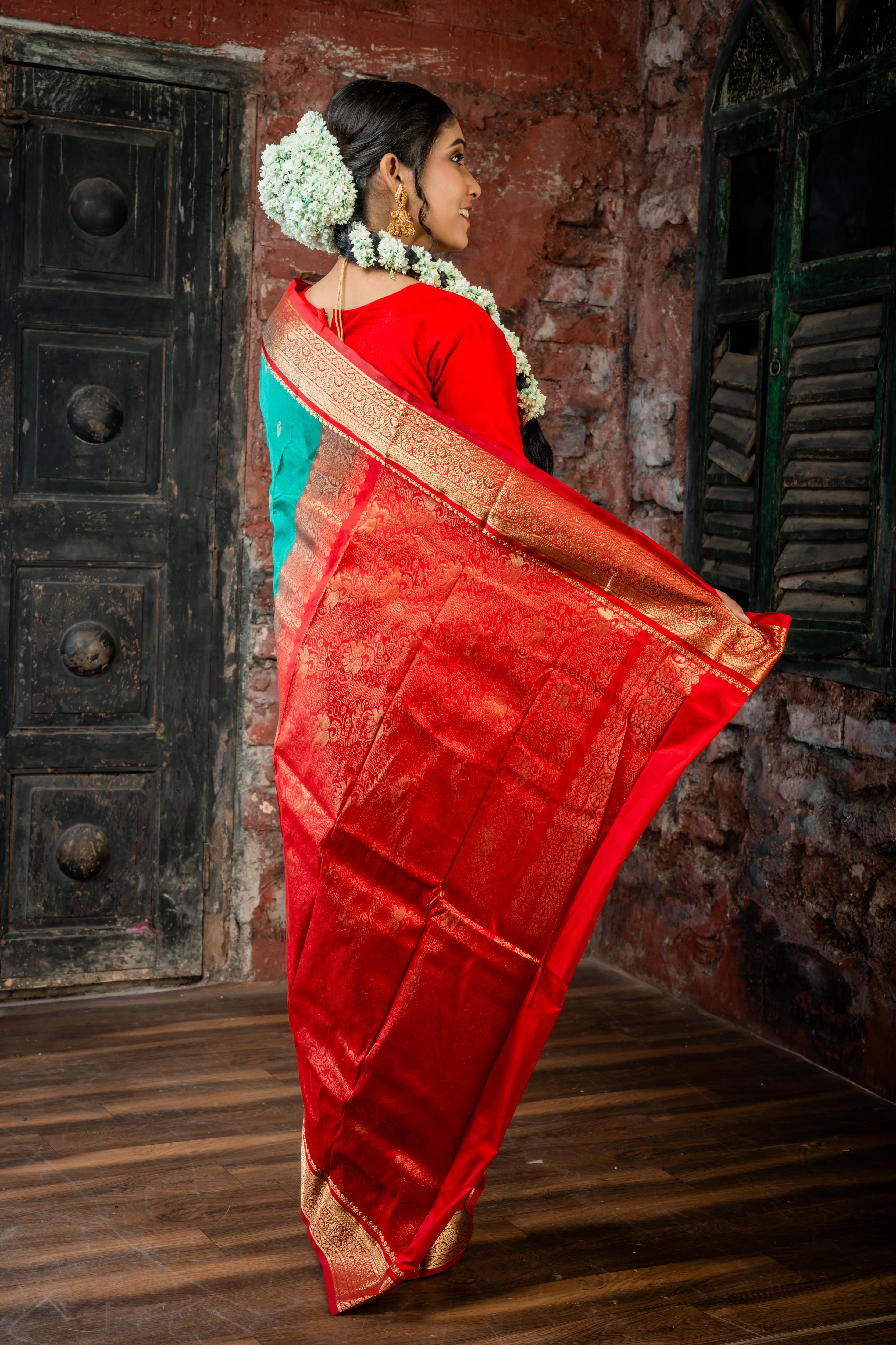 Vamika || Emerald Green Kanjivaram Silk Saree with all over Matte Gold Zari Buta and Dark Red & Matte Gold Zari Traditional design Border & Pallu