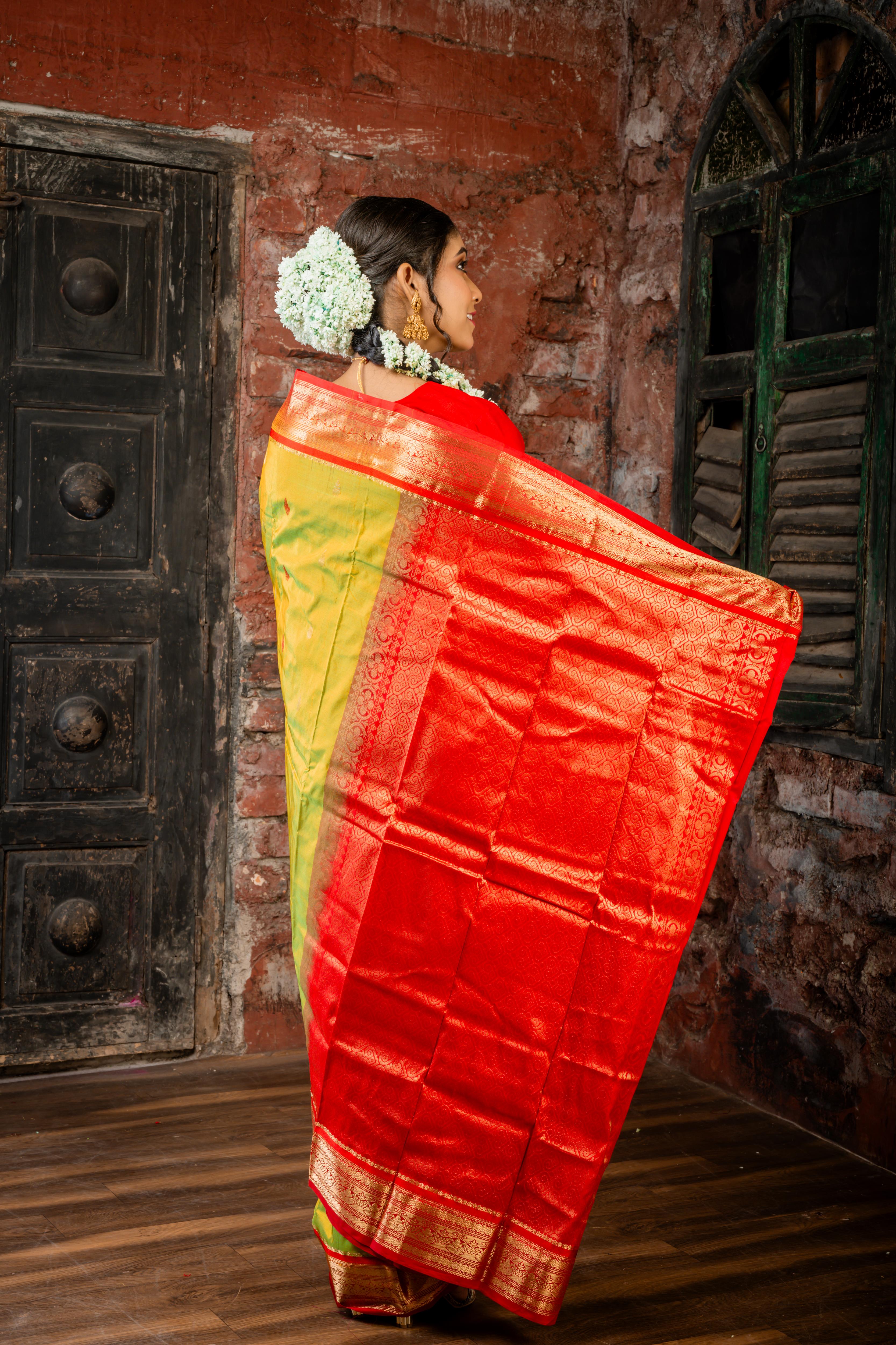 Vanathi || Olive Green & Gold dual tone Kanjivaram Silk Saree with all over Matte Gold Zari & Red Resham Buta and Red & Matte Gold Zari Traditional design Border & Pallu