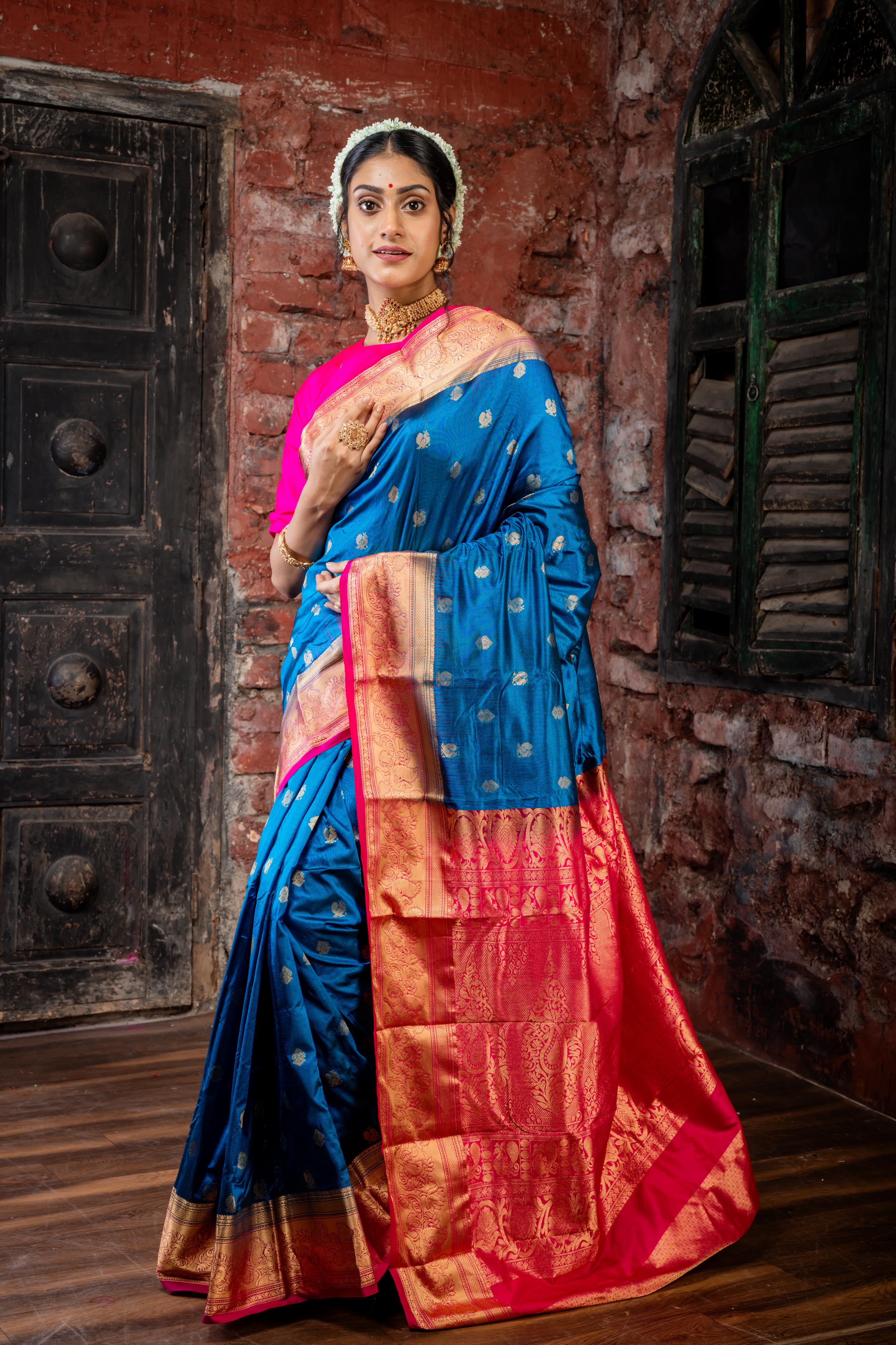 Mayura || Peacock Blue Pure Kanjivaram Silk Handloom Saree with all over Golden Zari 'Peacock' motif Buta, Magenta broad & Golden Zari Border and traditional design Pallu