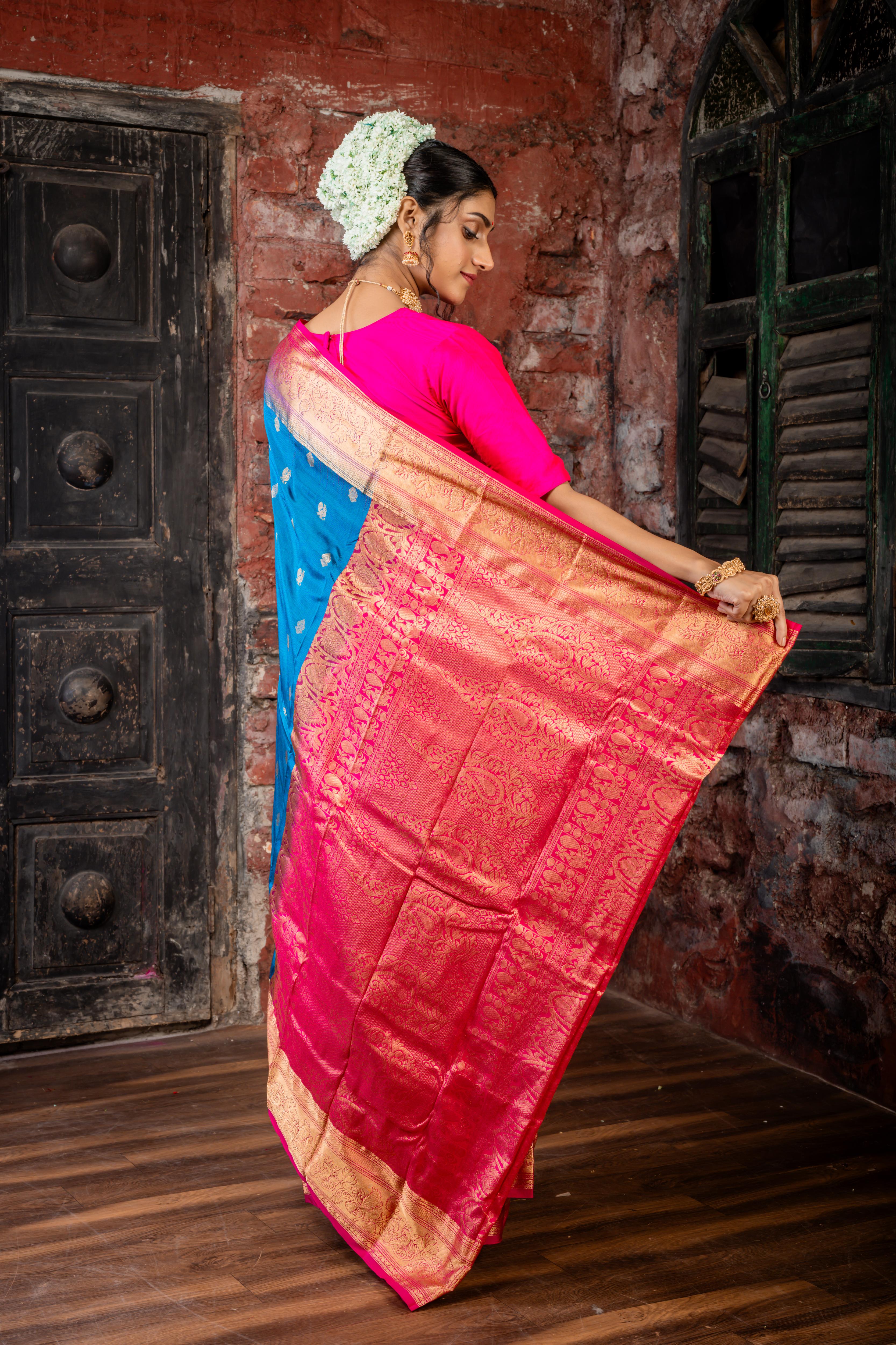 Mayura || Peacock Blue Pure Kanjivaram Silk Handloom Saree with all over Golden Zari 'Peacock' motif Buta, Magenta broad & Golden Zari Border and traditional design Pallu