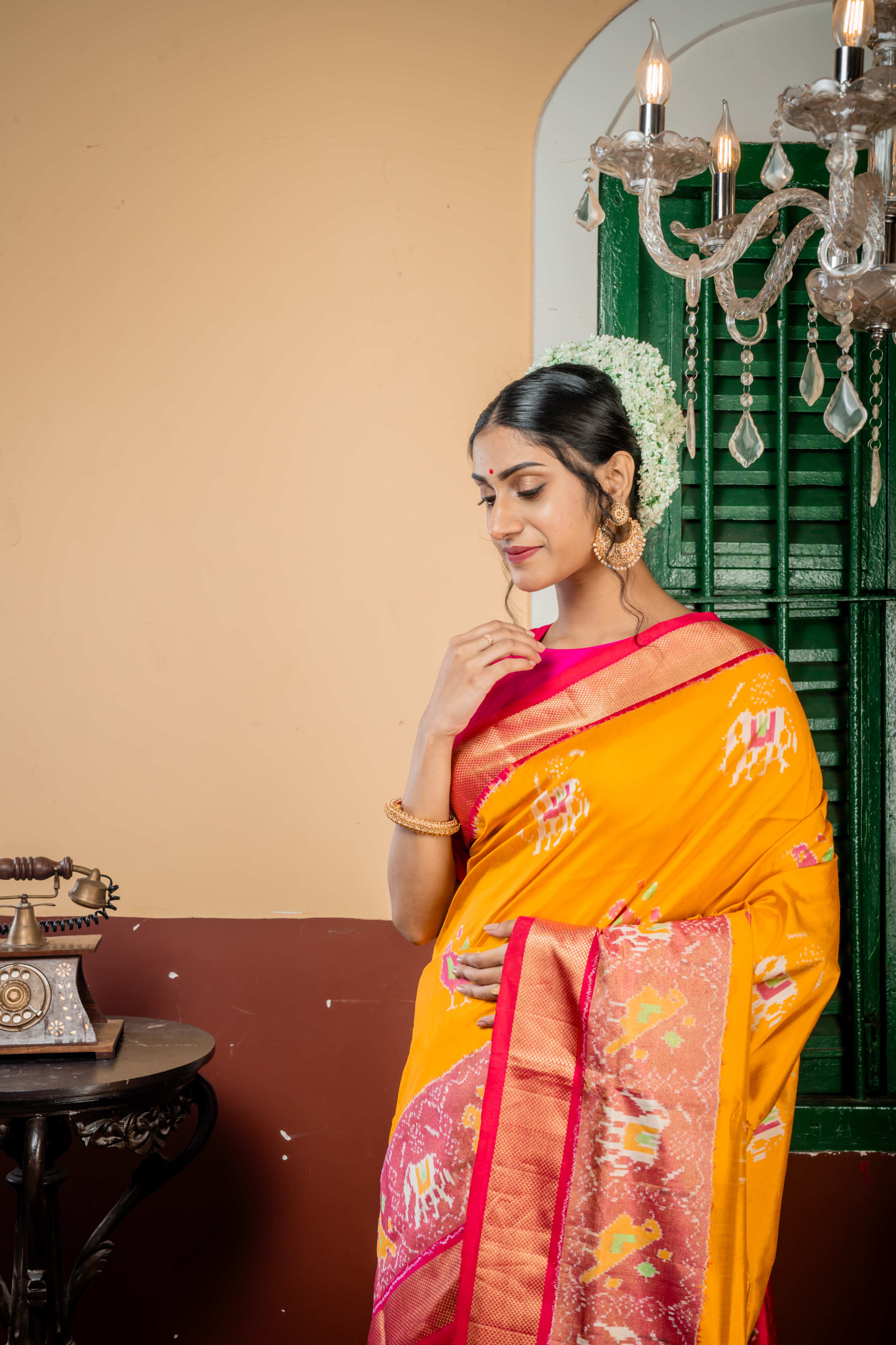 Revathi || Golden Yellow Pure Silk Ikkat Handloom Saree with all over Multi-colour 'Elephant' & 'Bird' motif and Magenta-Red dual tone & Antique Zari Ikkat Border & Pallu