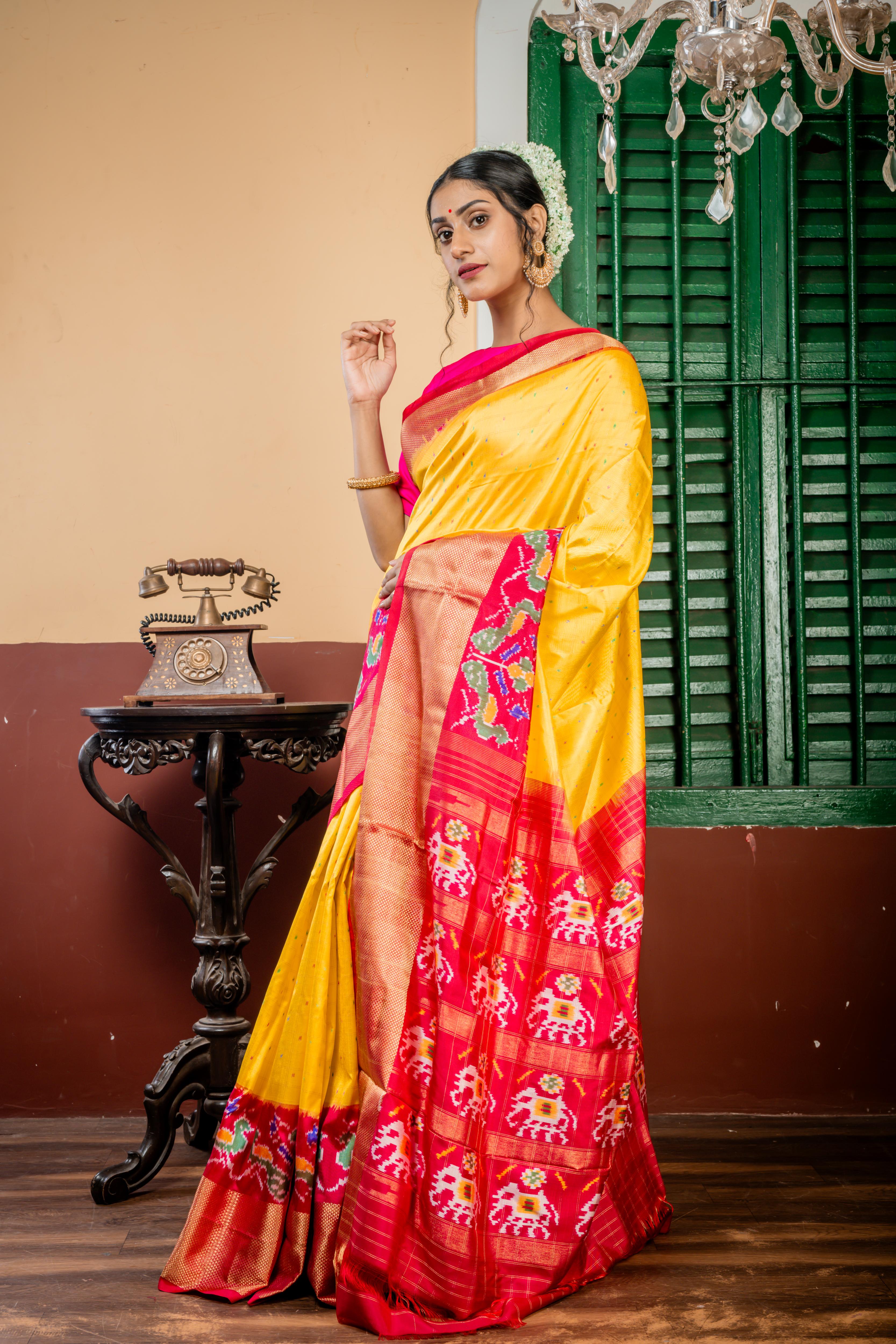 Gajagamini || Bright Yellow Pure Silk Pochampally Handloom Saree with all over Multi-colour Ikkat Buti & Matte Gold Zari Checks, Magenta Pink & Red dual tone with Antique Gold Zari Ikkat Border & Pallu with Zari Checks highlights
