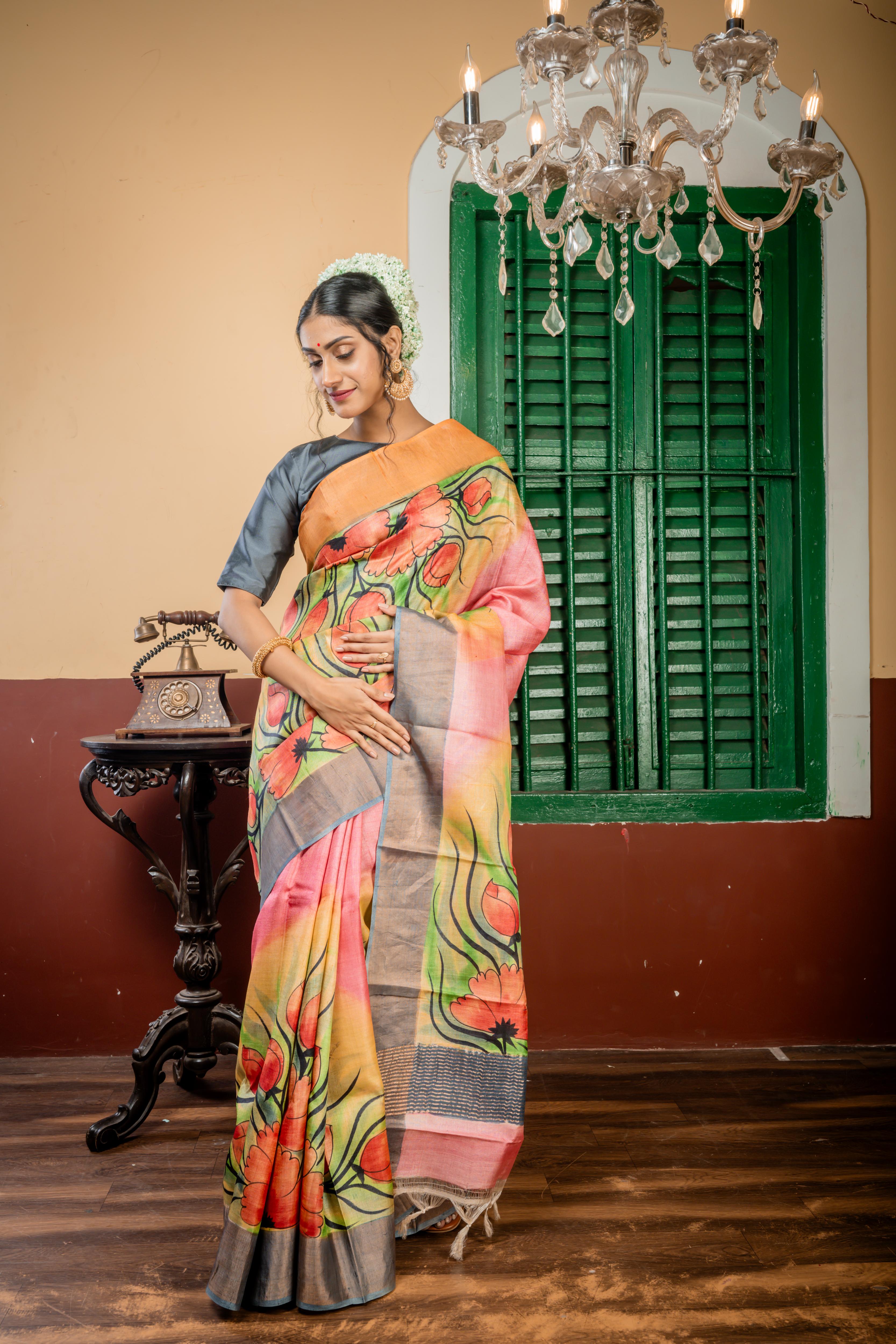 Chitrika || Light Pink & Multi-colour shaded Pure Tussar Handloom Silk Saree with Smokey Grey-Antique Gold Zari & Light Tangerine-Copper 'Ganga Jamuna' Border and Multi-colour Foral Hand Paint Body & Pallu