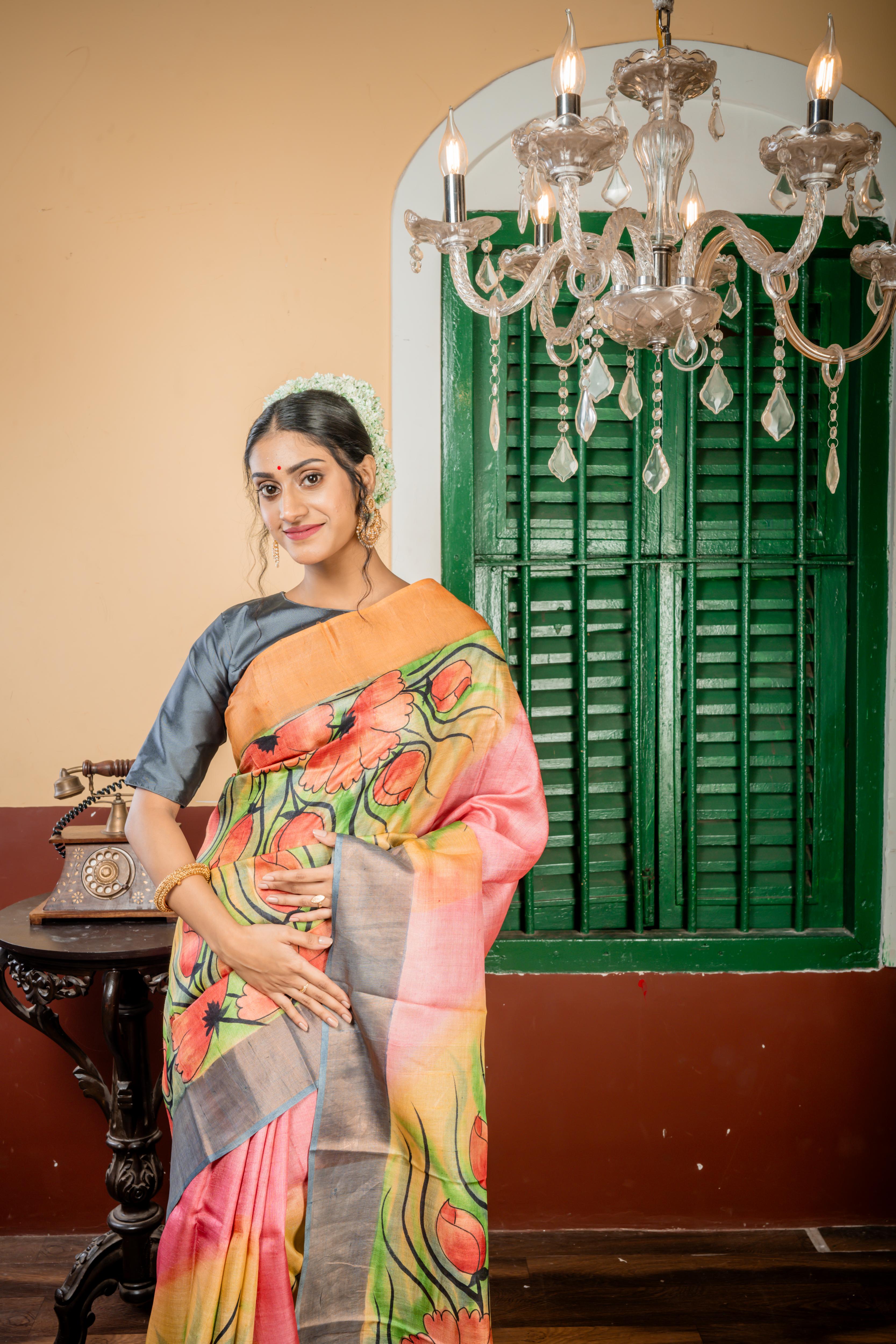 Chitrika || Light Pink & Multi-colour shaded Pure Tussar Handloom Silk Saree with Smokey Grey-Antique Gold Zari & Light Tangerine-Copper 'Ganga Jamuna' Border and Multi-colour Foral Hand Paint Body & Pallu