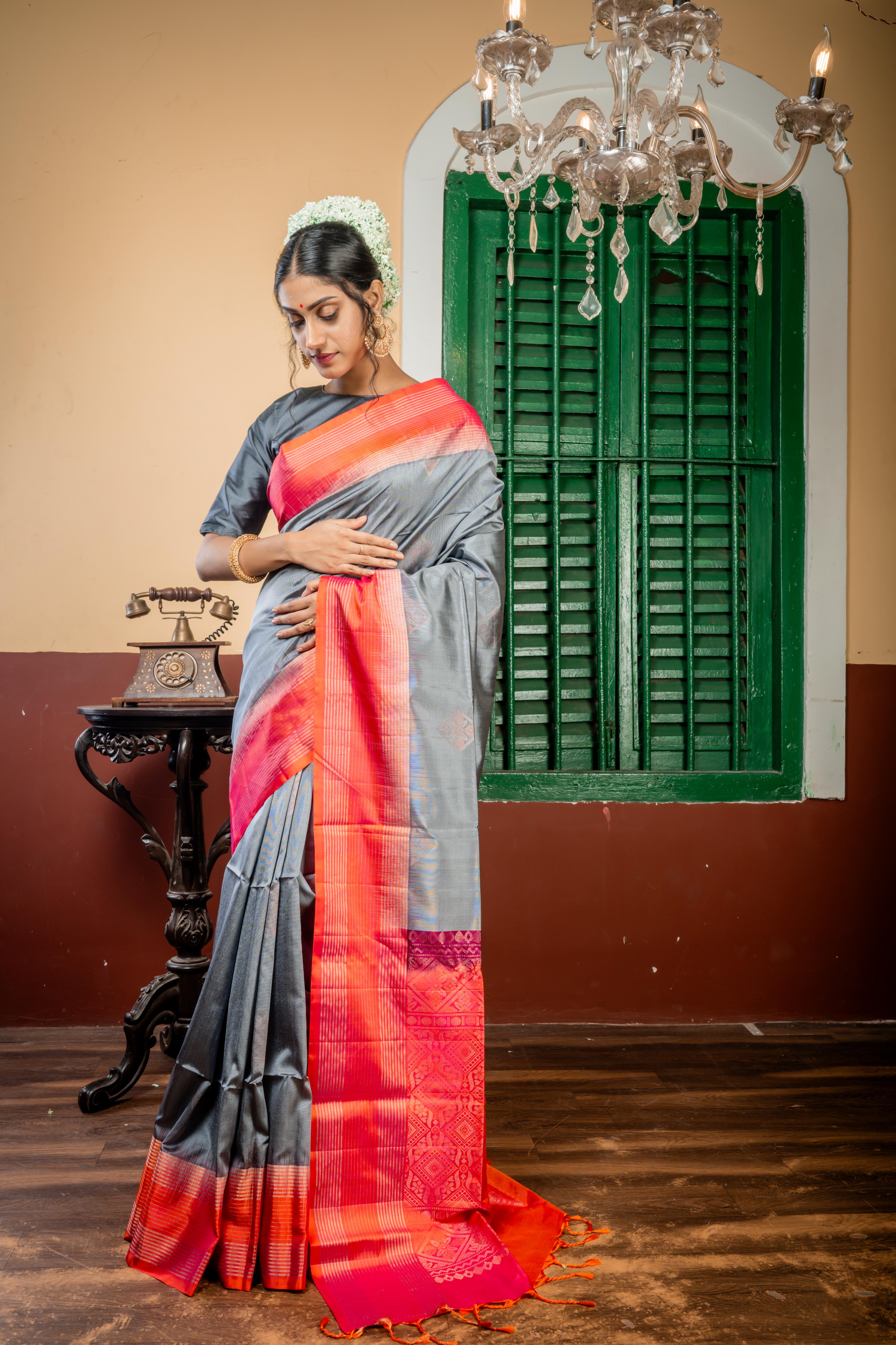 Veena || Slate Grey Pattu Soft Silk Handloom Saree with all over Antique Copper & Antique Silver Zari Traditional Buta, Magenta Pink & Orange dual-tone Border and Pallu with Antique Copper & Antique Silver Zari Traditional design