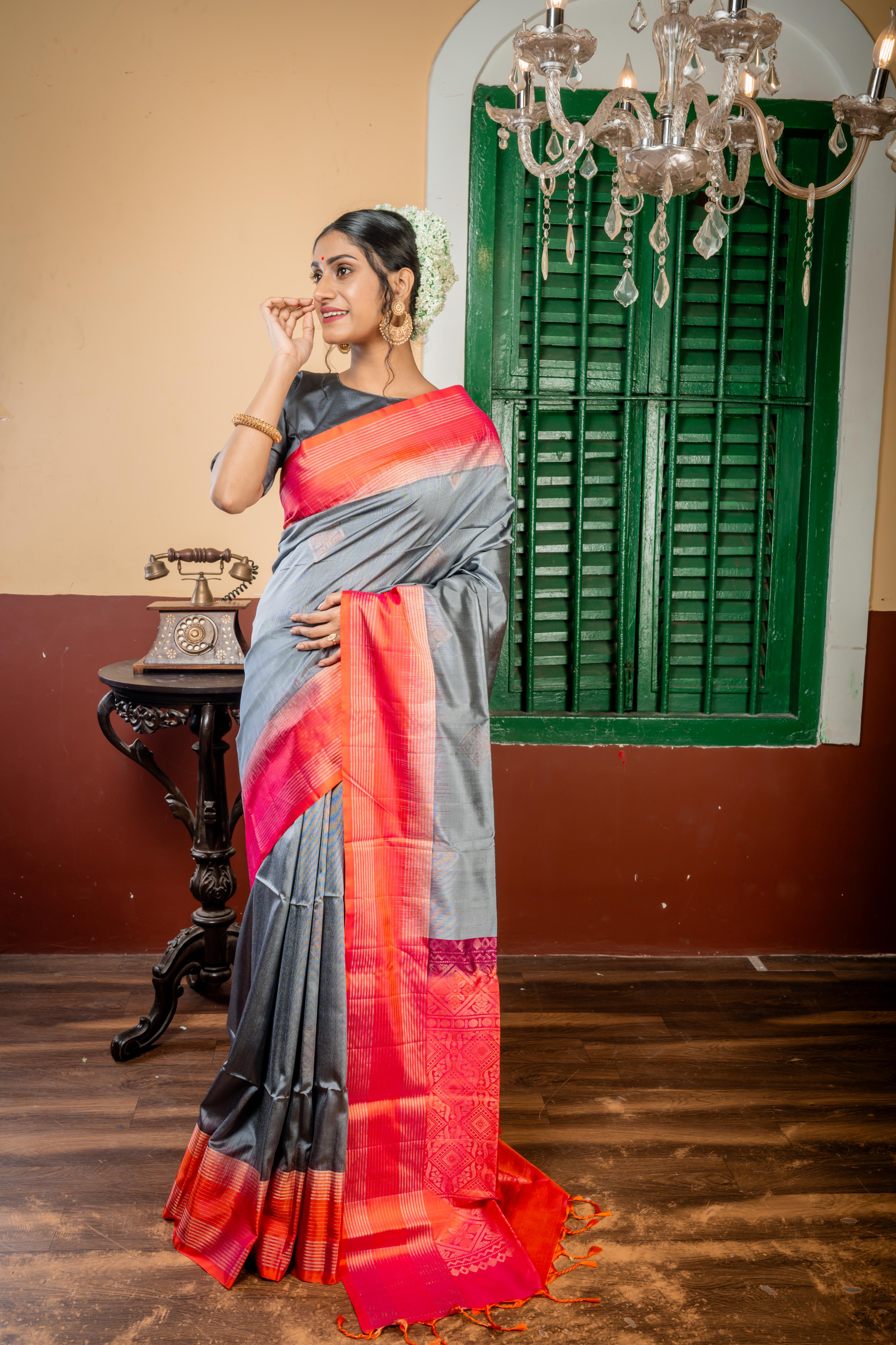 Veena || Slate Grey Pattu Soft Silk Handloom Saree with all over Antique Copper & Antique Silver Zari Traditional Buta, Magenta Pink & Orange dual-tone Border and Pallu with Antique Copper & Antique Silver Zari Traditional design