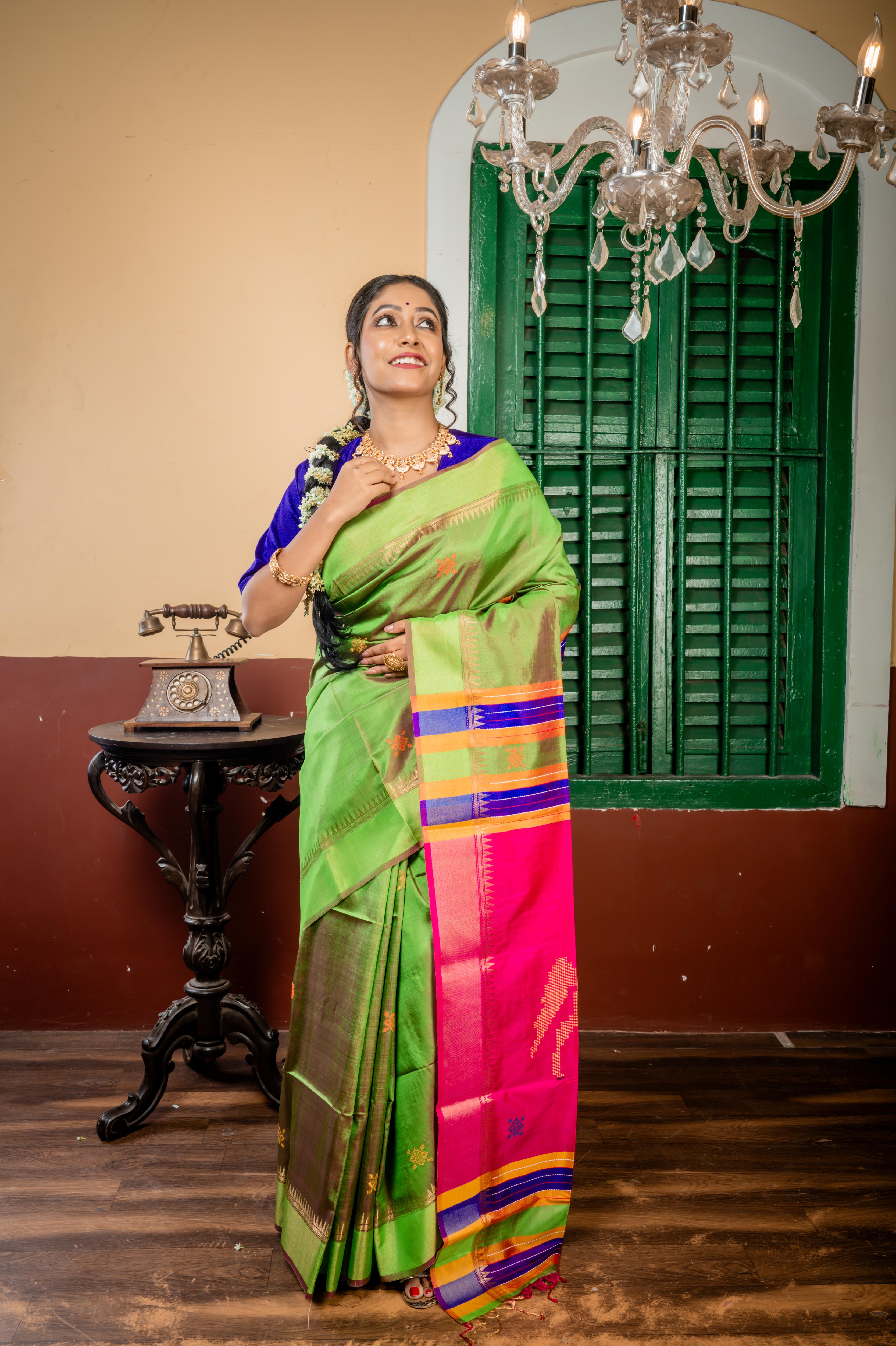 Ashwini || Parrot Green & Magenta dual tone Pure Bishnupuri Katan Handloom 'Kalakshetra' Embroidery Saree with all over Multi-colour Buta and Stripe & 'Horse' motif Pallu