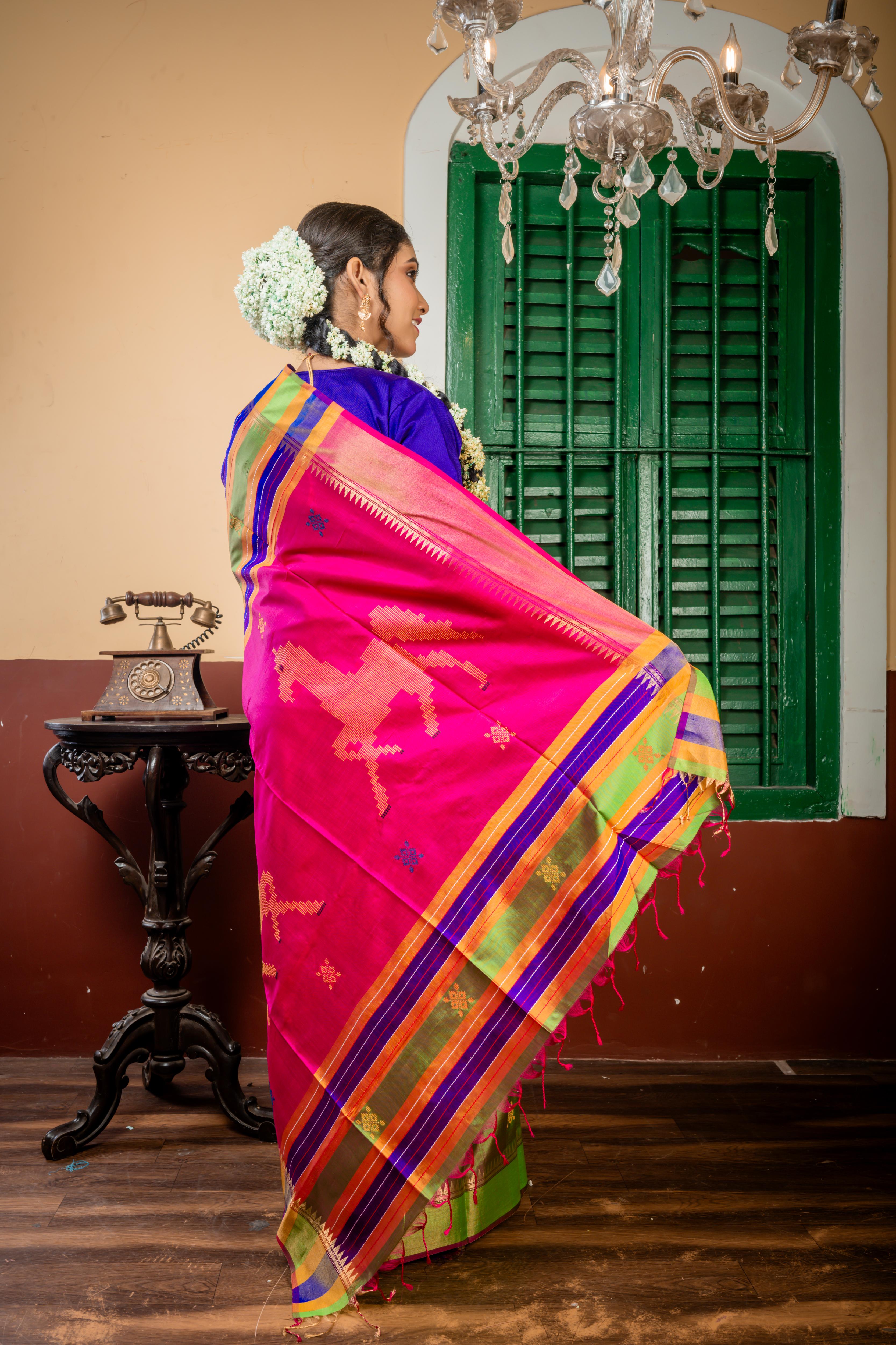 Ashwini || Parrot Green & Magenta dual tone Pure Bishnupuri Katan Handloom 'Kalakshetra' Embroidery Saree with all over Multi-colour Buta and Stripe & 'Horse' motif Pallu