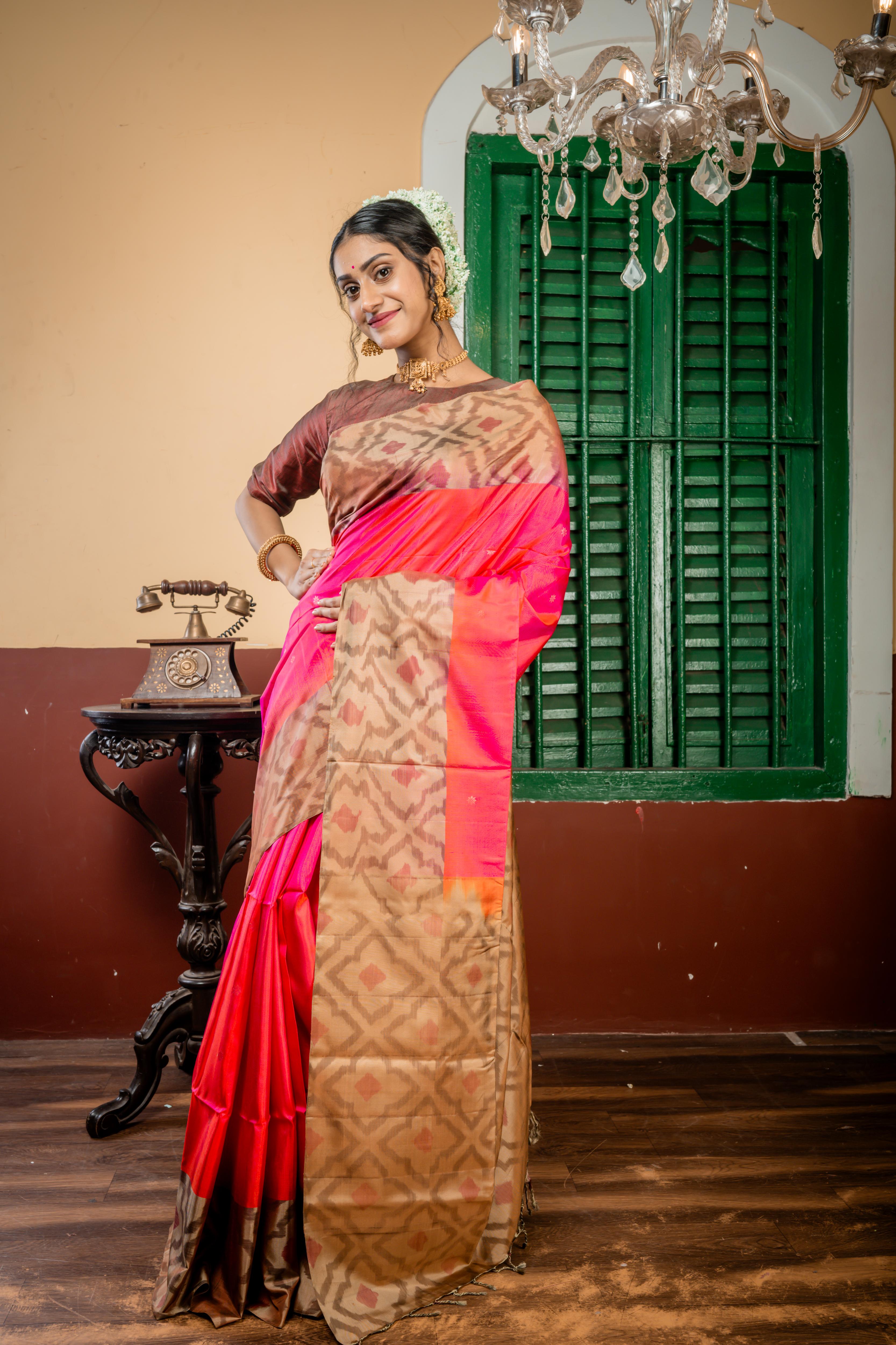 Udisha || Magenta & Rust Orange dual tone Pattu Soft Silk Handloom Saree with all over Copper Zari Buti & Buta and Peanut Brown & Antique Gold dual tone Abstract Border & Pallu