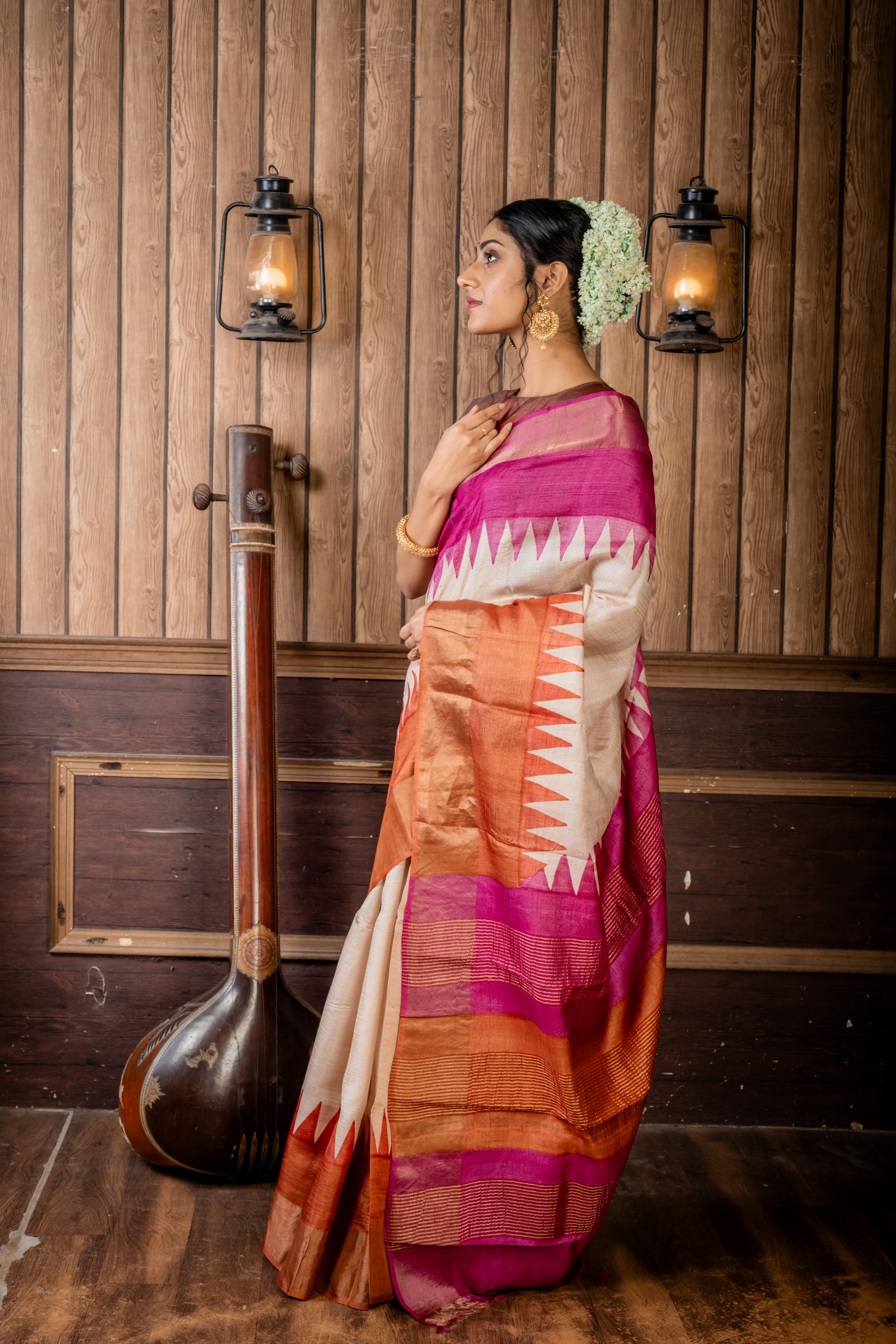 Madhurima || Beige Tussar Saree with Onion Pink & Earthy Brown Temple design Hand Paint 'Ganga-Jamuna' Border and Colour Block & Antique Gold Zari highlights Stripe Pallu