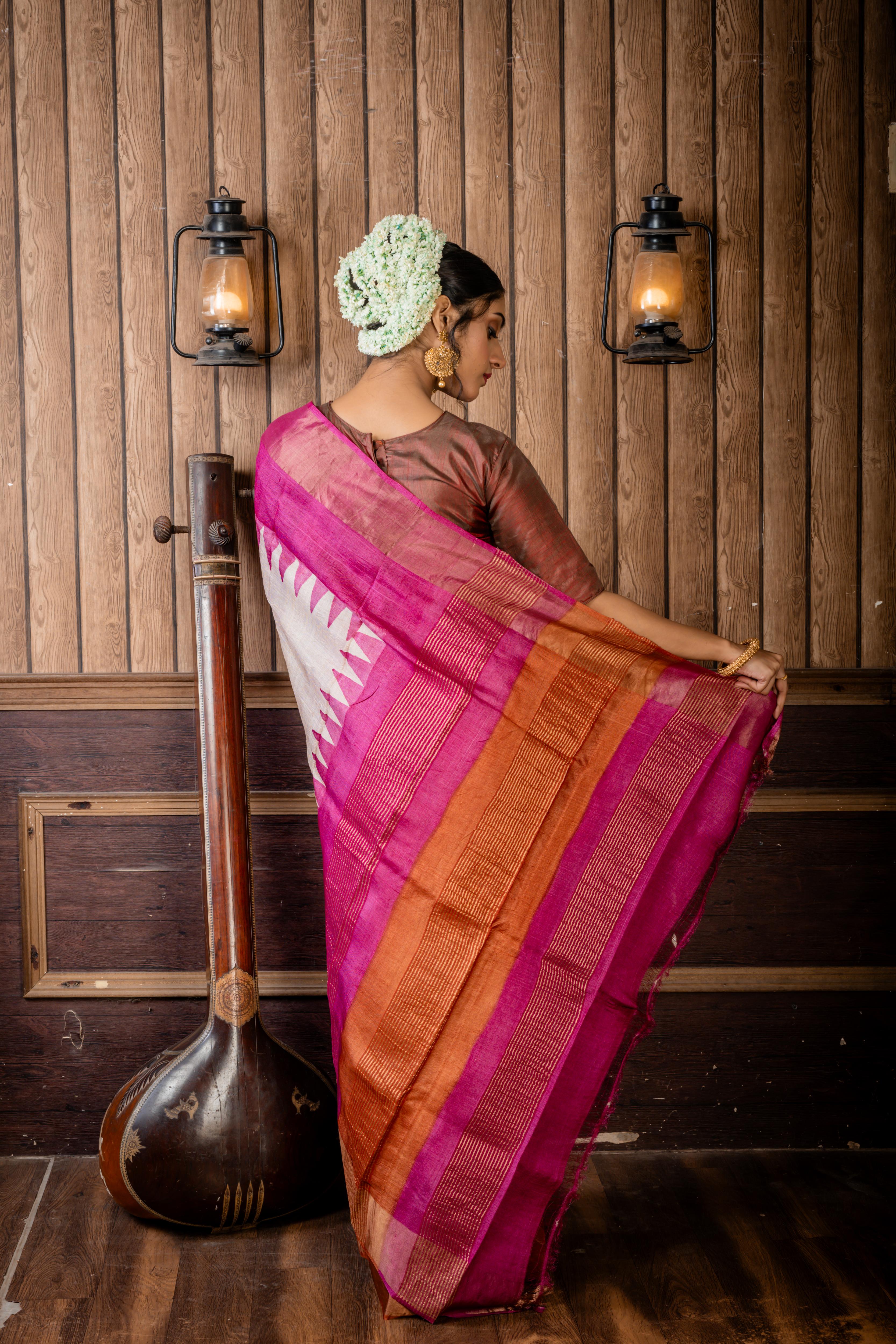 Madhurima || Beige Tussar Saree with Onion Pink & Earthy Brown Temple design Hand Paint 'Ganga-Jamuna' Border and Colour Block & Antique Gold Zari highlights Stripe Pallu