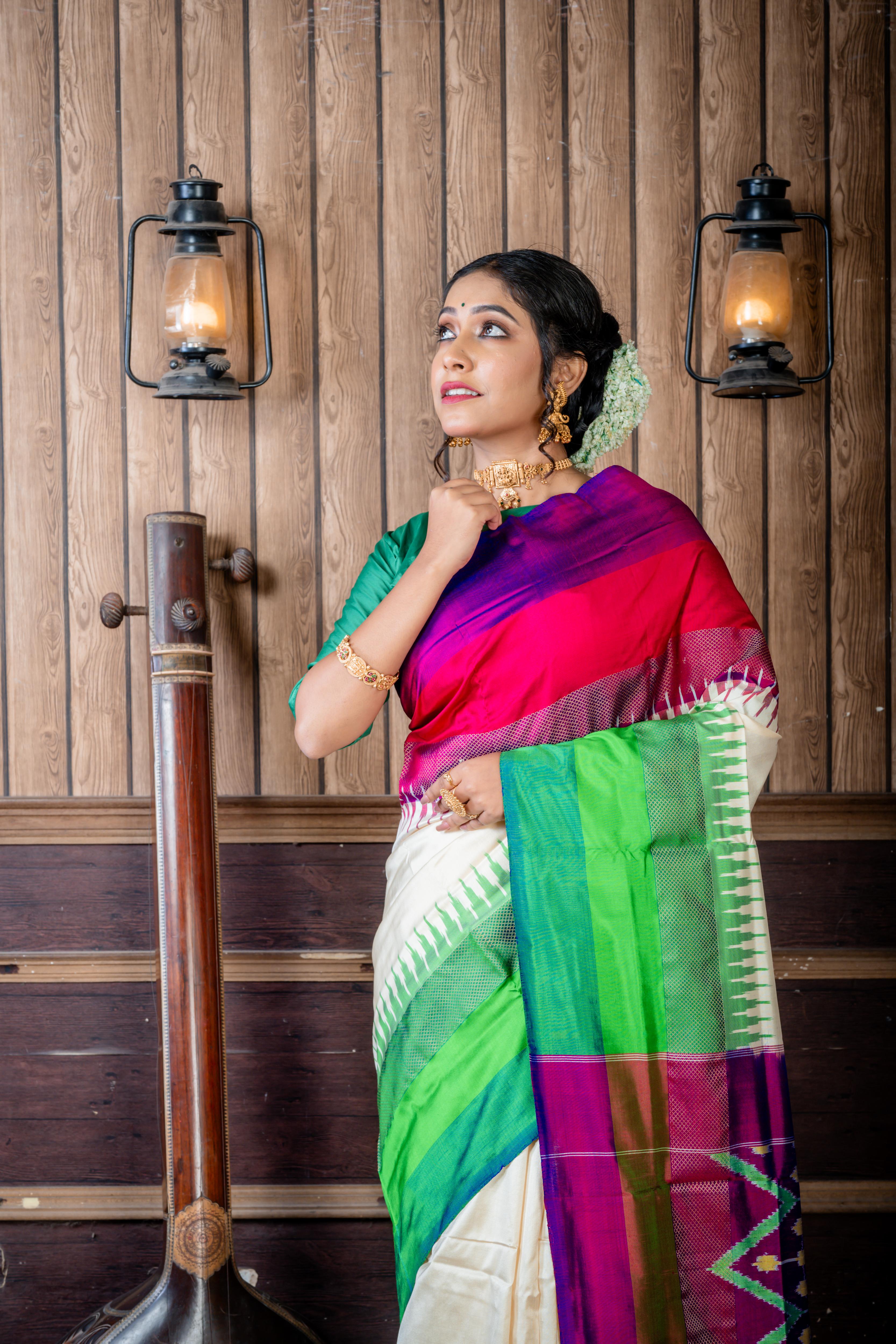Palakshi || Off-White Pure Pochampally Silk Handloom Saree with Plain Body, Light with Dark Green & Matte Gold Zari and Magenta with Purple & Antique Gold Zari 'Ganga-Jamuna' Temple Border; and Purple 3D Ikkat Pallu