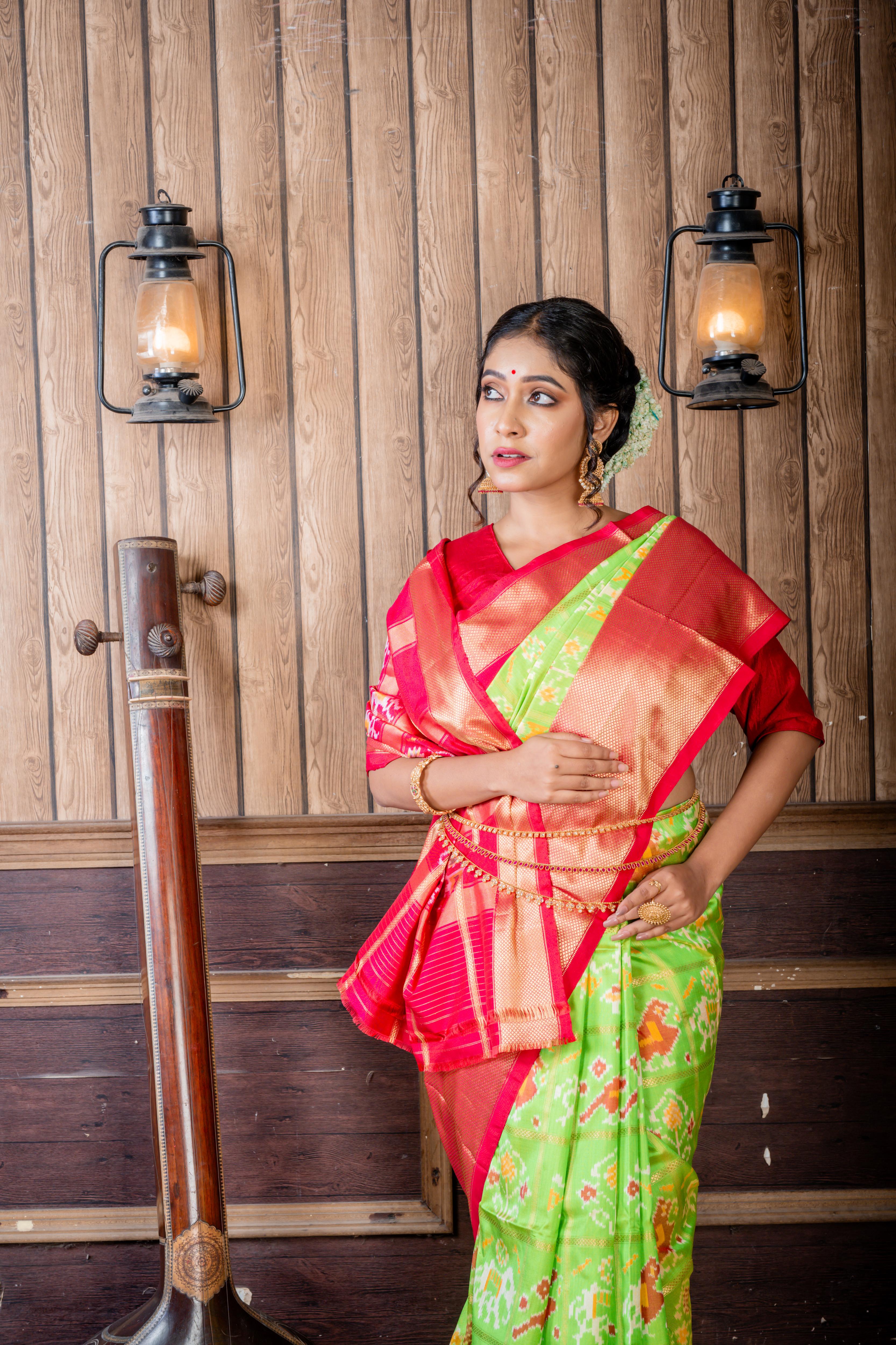 Vasundhara || Parrot Green Pure Silk Pochampally Handloom Saree with all over Multi-colour Ikkat design & Matte Gold Zari Checks, Beetroot Pink & Antique Gold Zari Traditional design Border & Pallu with Zari Checks highlights
