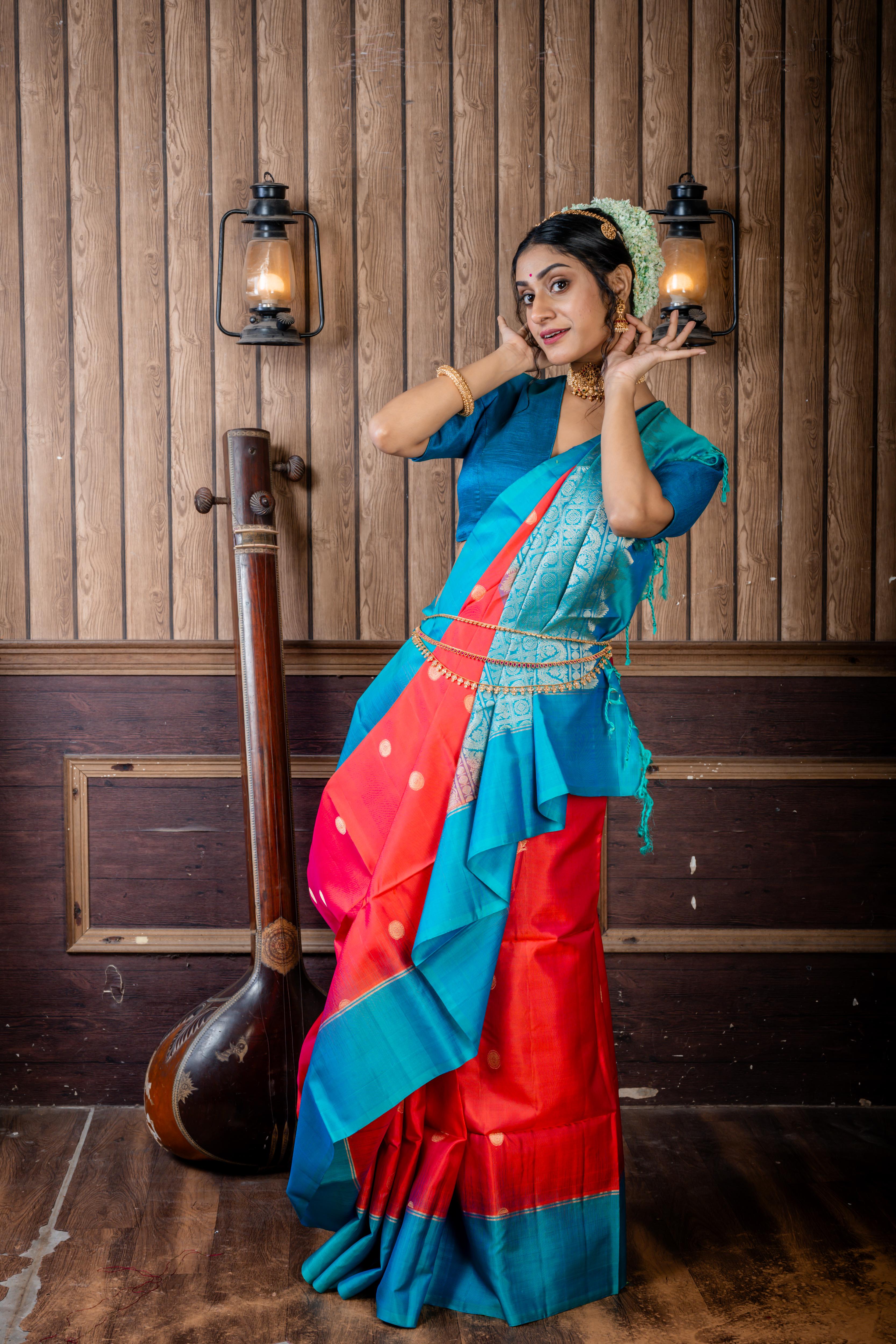 Lalitha || Magenta & Rust Orange dual tone Pattu Soft Silk Handloom Saree with all over Antique Gold Zari Buta and Turquoise Blue & Teal Green dual-tone Plain Border & Pallu with Matte Gold Zari Traditional Checks design