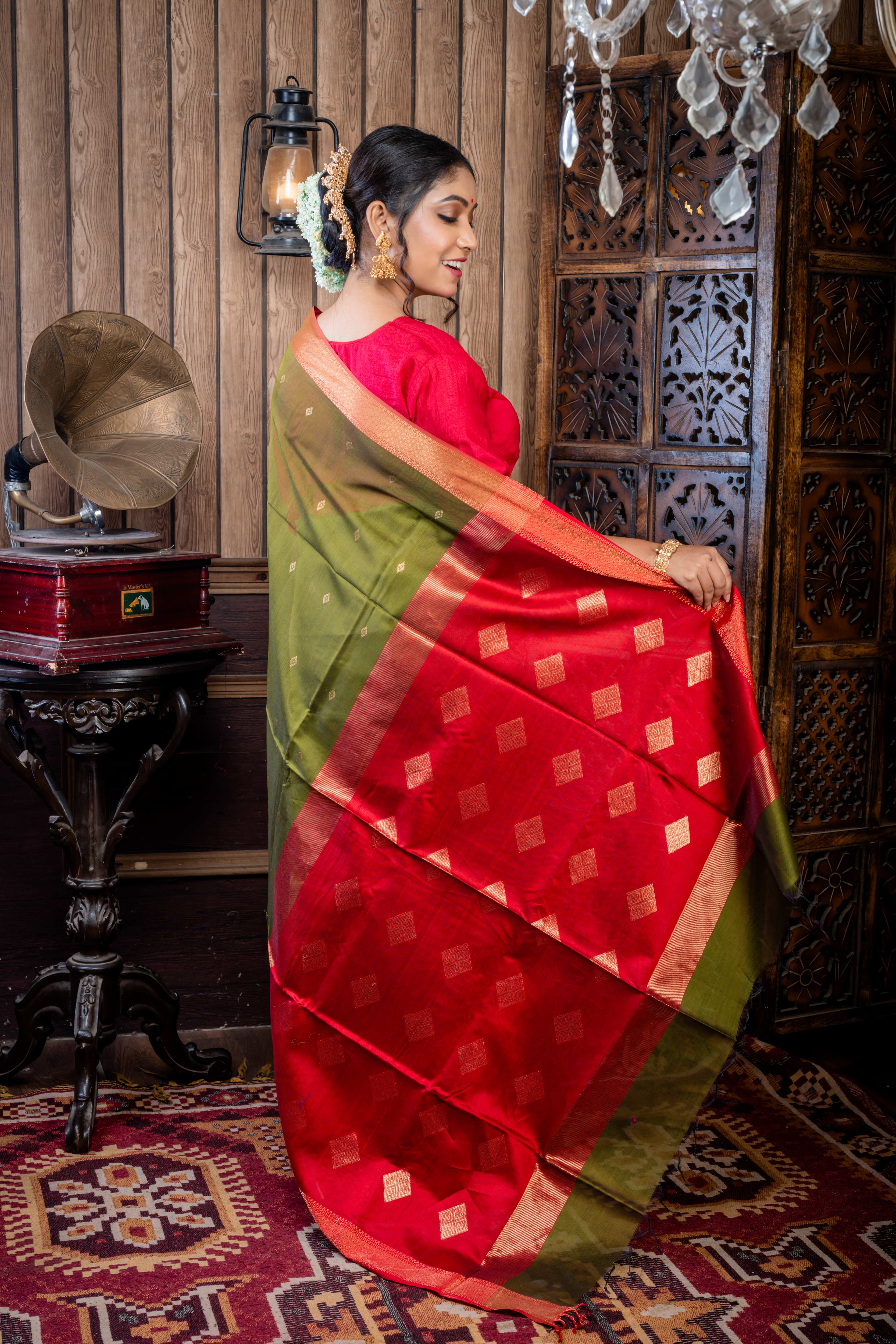 Vidushi || Dark Moss Green Cotton Resham Maheshwari Handloom Saree with all over Matte Gold Zari Buta, Red Clay & Antique Gold Zari Brocade Border and Red & Antique Gold Pallu with Stripe & Traditional Motif