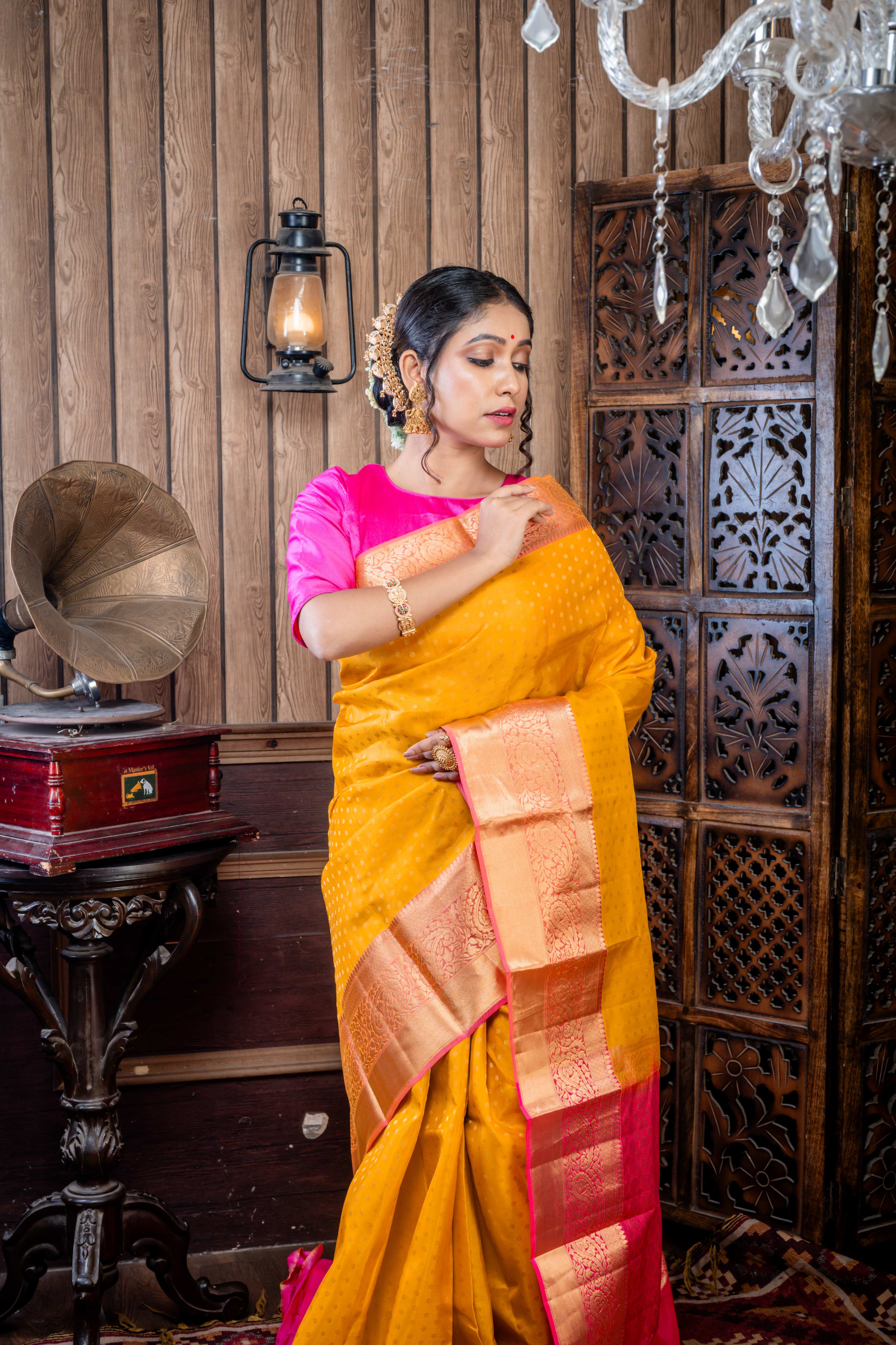 Saipriya || Mustard Yellow Kora Silk Saree with all over Matte Gold Zari Buti, Light Magenta Pink & Matte Gold Zari Border and Antique Zari Floral motif Pallu