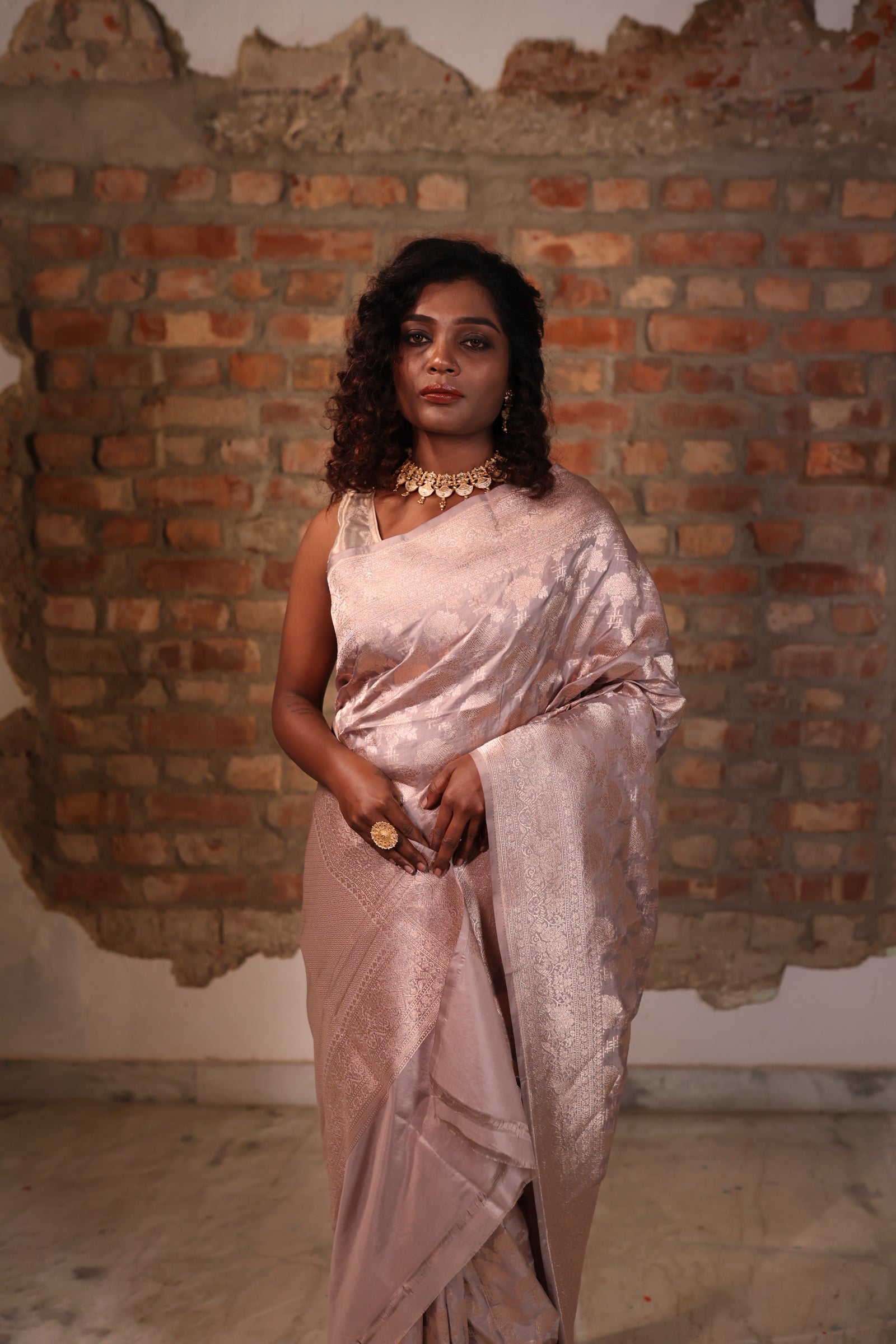 Ananya || Mushroom Grey Pure Katan Banarasi Saree with all over Floral Jaal woven in Matte Copper Zari