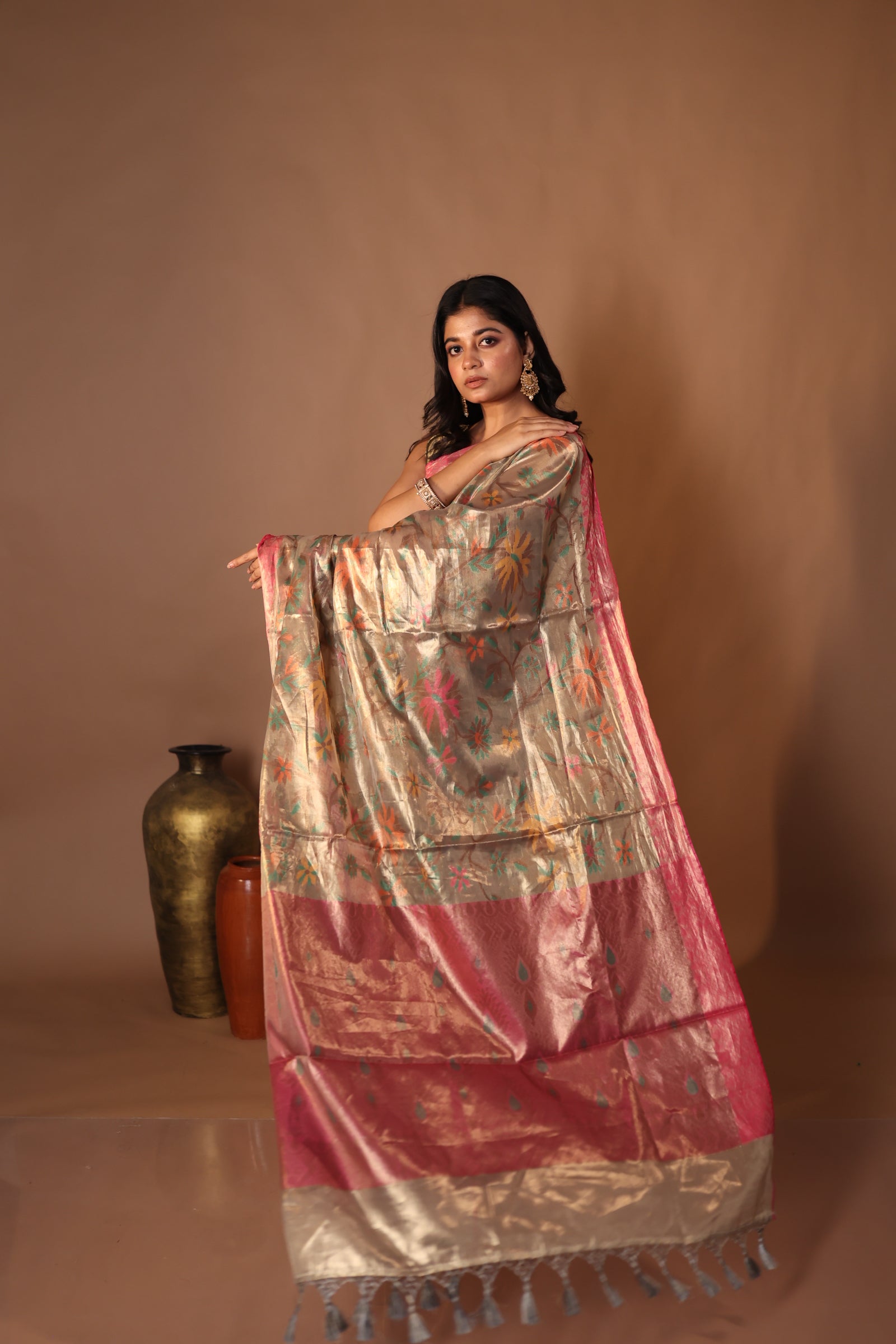 Reyanshi || Metallic Ash Brown Pure Tissue Banarasi Handloom Saree with all over Multi-colour Resham Floral Jaal, Magenta Pink border & Antique Gold Pallu