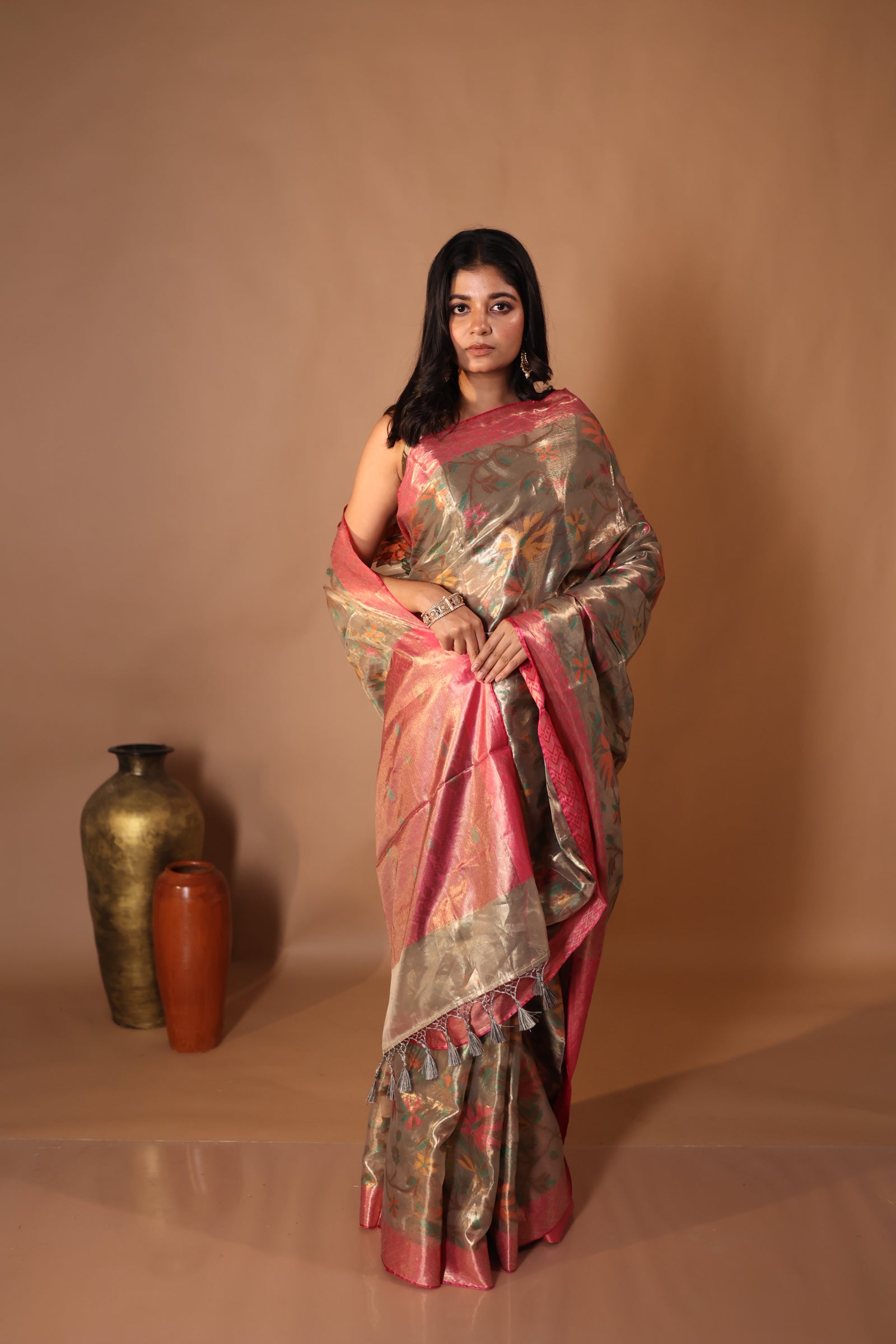 Reyanshi || Metallic Ash Brown Pure Tissue Banarasi Handloom Saree with all over Multi-colour Resham Floral Jaal, Magenta Pink border & Antique Gold Pallu