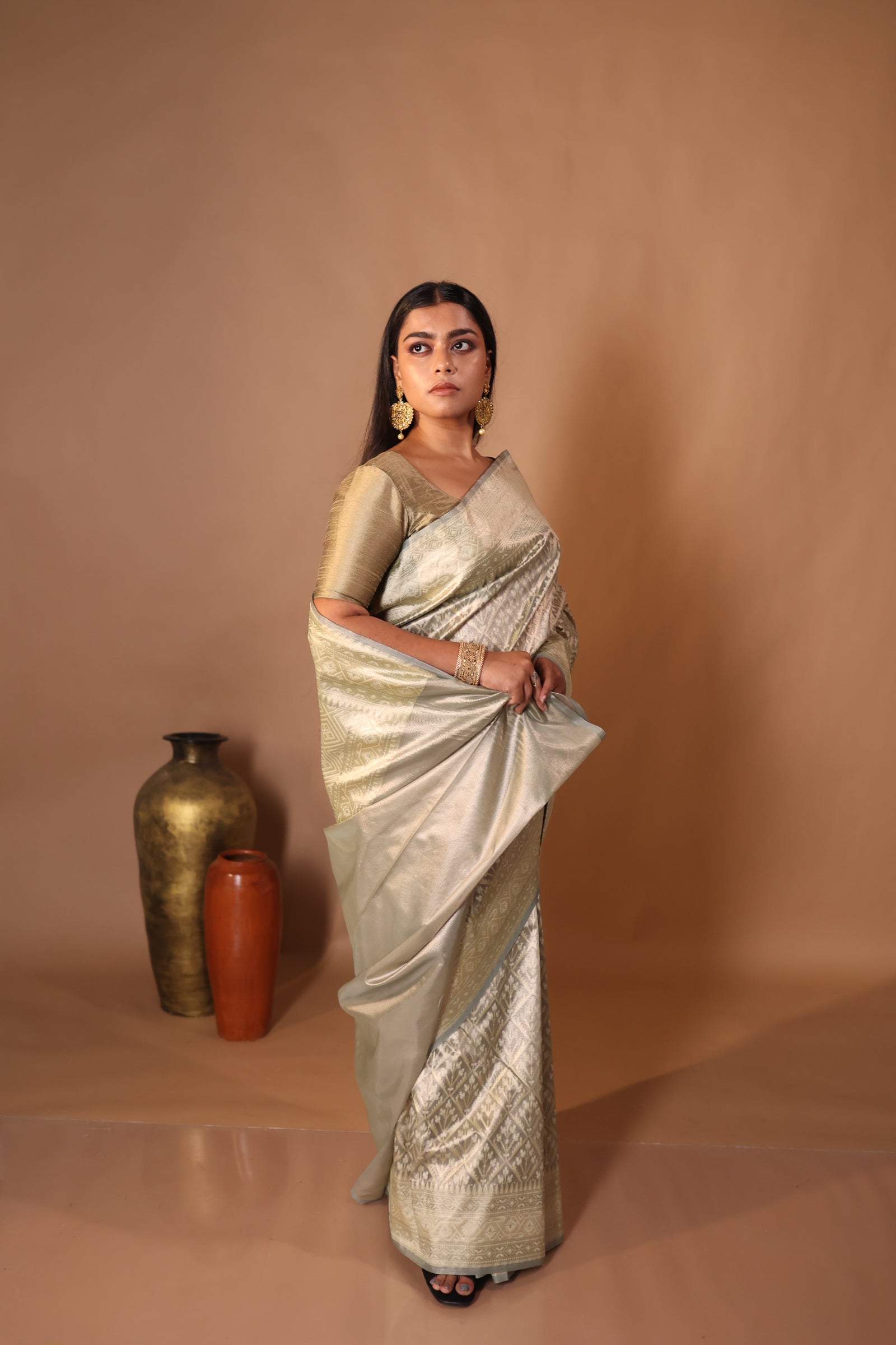 Komal || Metallic Ash Chanderi Katan Tissue Banarasi Saree with all over Leaf motif Buta & Jaal woven in Matte Gold Zari