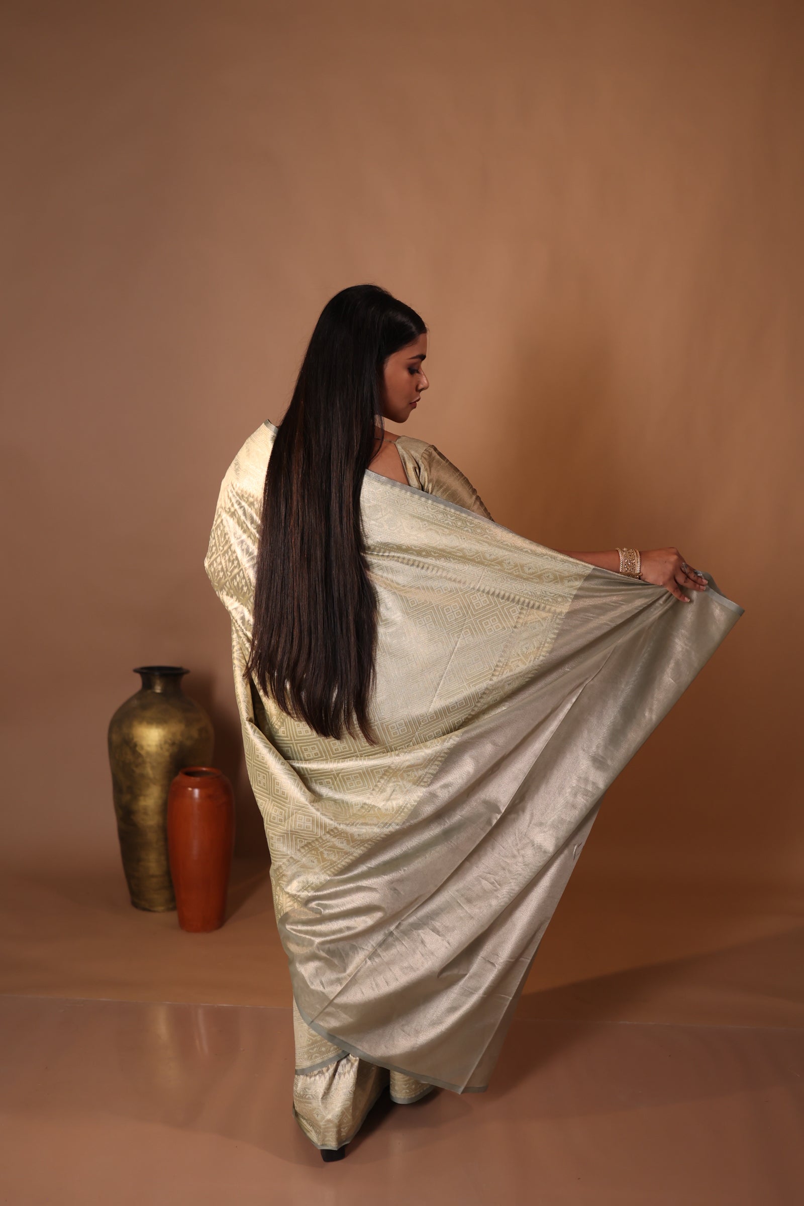 Komal || Metallic Ash Chanderi Katan Tissue Banarasi Saree with all over Leaf motif Buta & Jaal woven in Matte Gold Zari