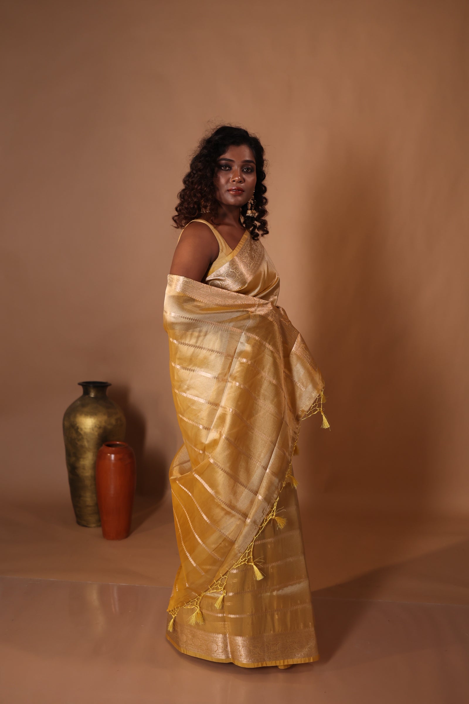 Anahita || Metallic Ochre Yellow Tissue Silk Banarasi Saree with all over Matte Gold Woven Stripes