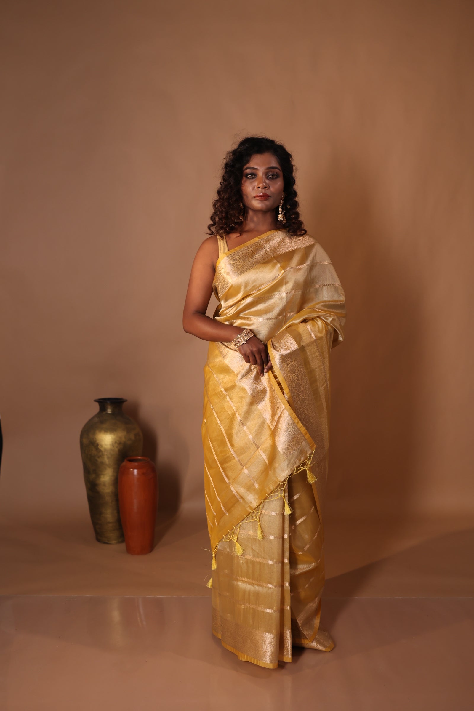 Anahita || Metallic Ochre Yellow Tissue Silk Banarasi Saree with all over Matte Gold Woven Stripes