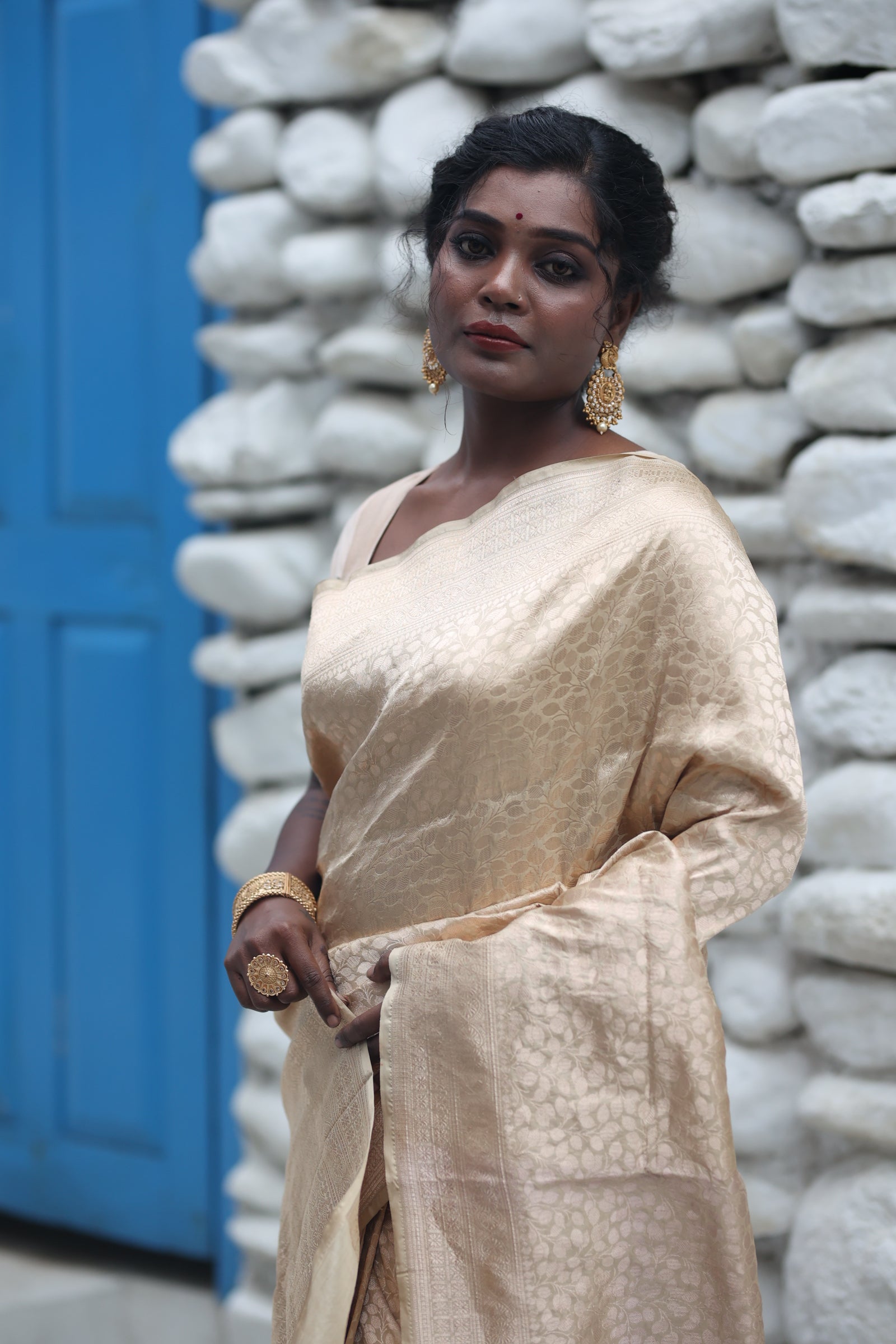 Swarnabha || Champagne Gold Pure Katan Banarasi Saree with all over Leaf Jaal woven in Matte Copper Zari