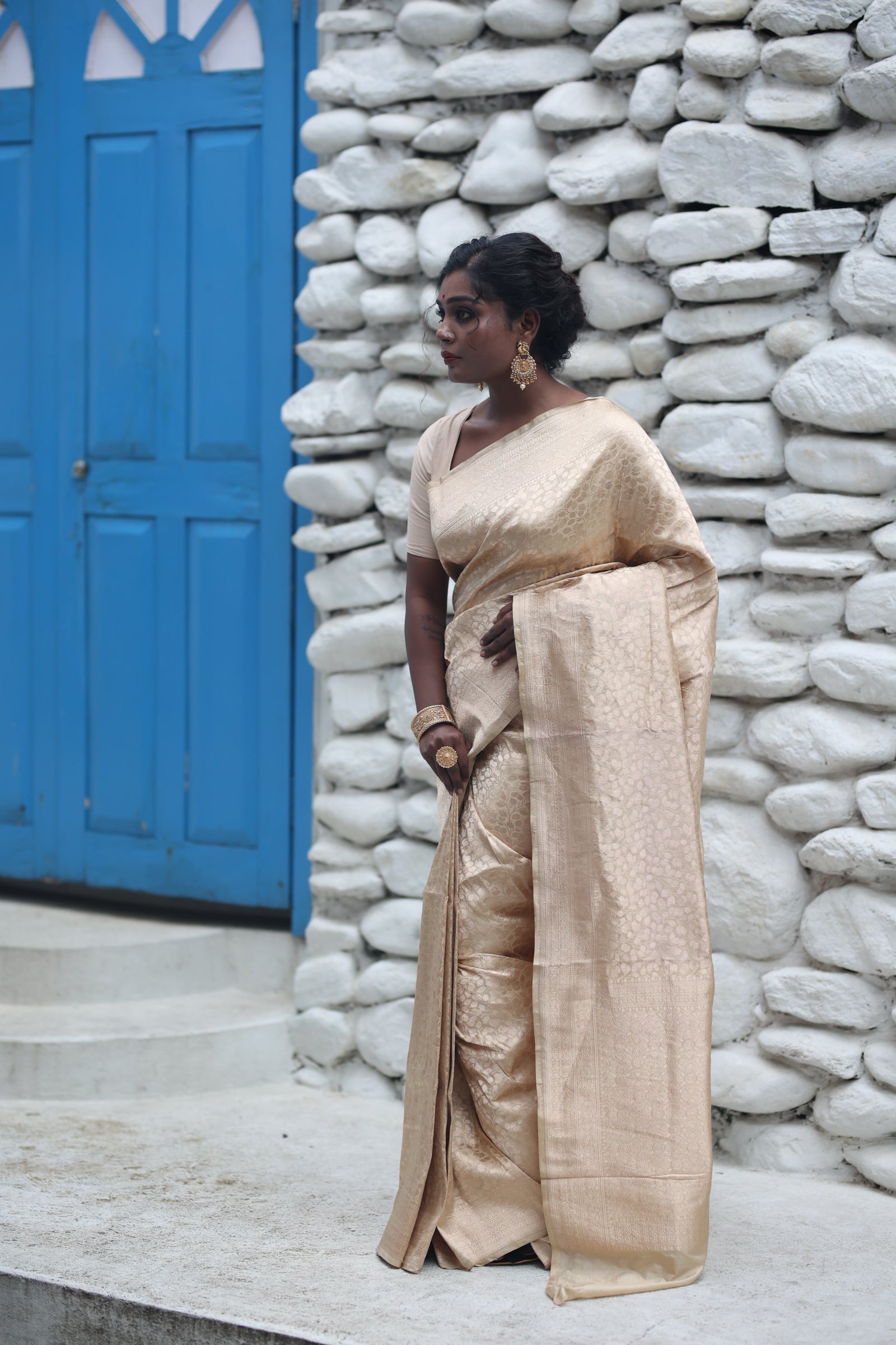 Swarnabha || Champagne Gold Pure Katan Banarasi Saree with all over Leaf Jaal woven in Matte Copper Zari